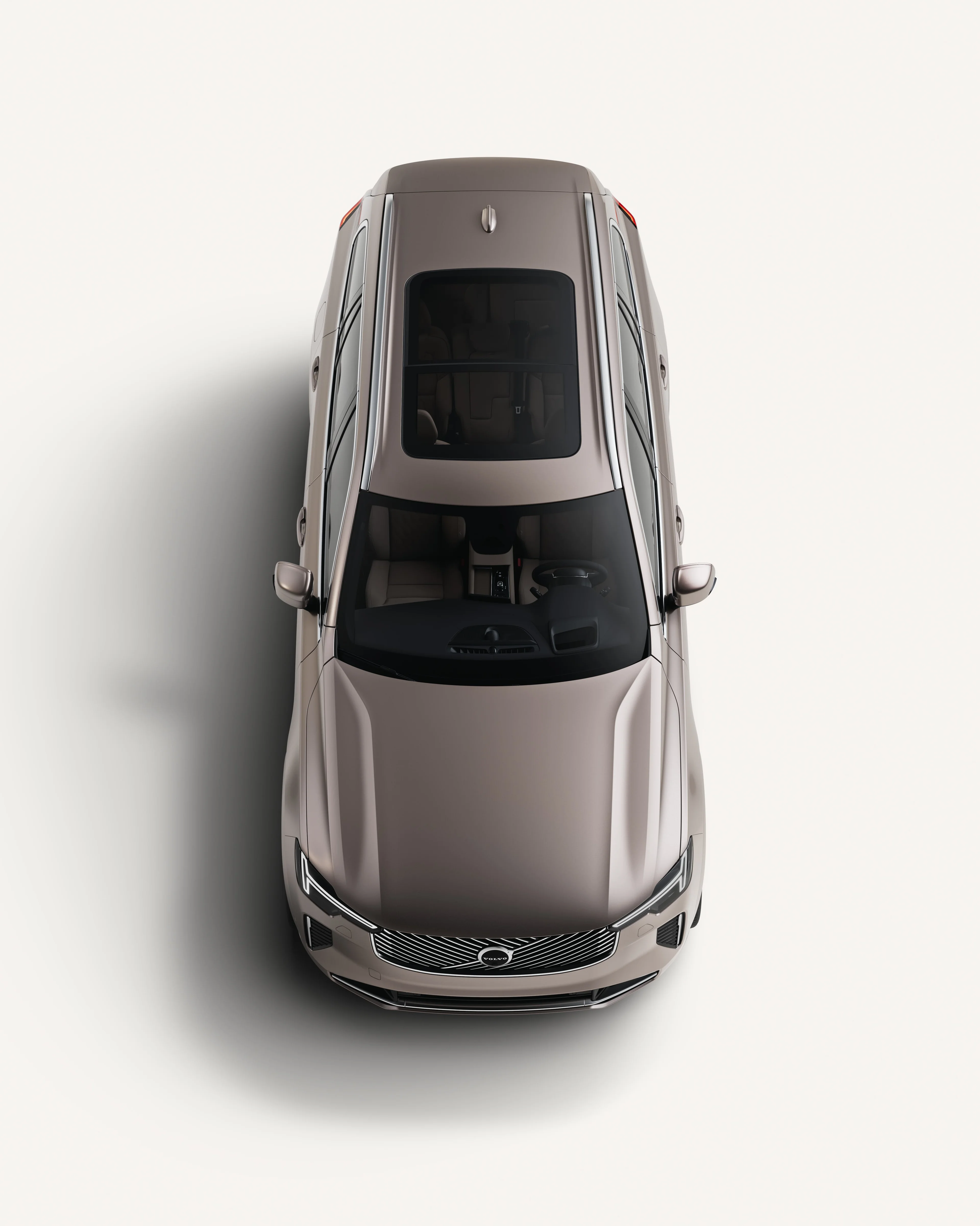 Top-down view of the Volvo XC90 showcasing its roof in a white studio environment.
