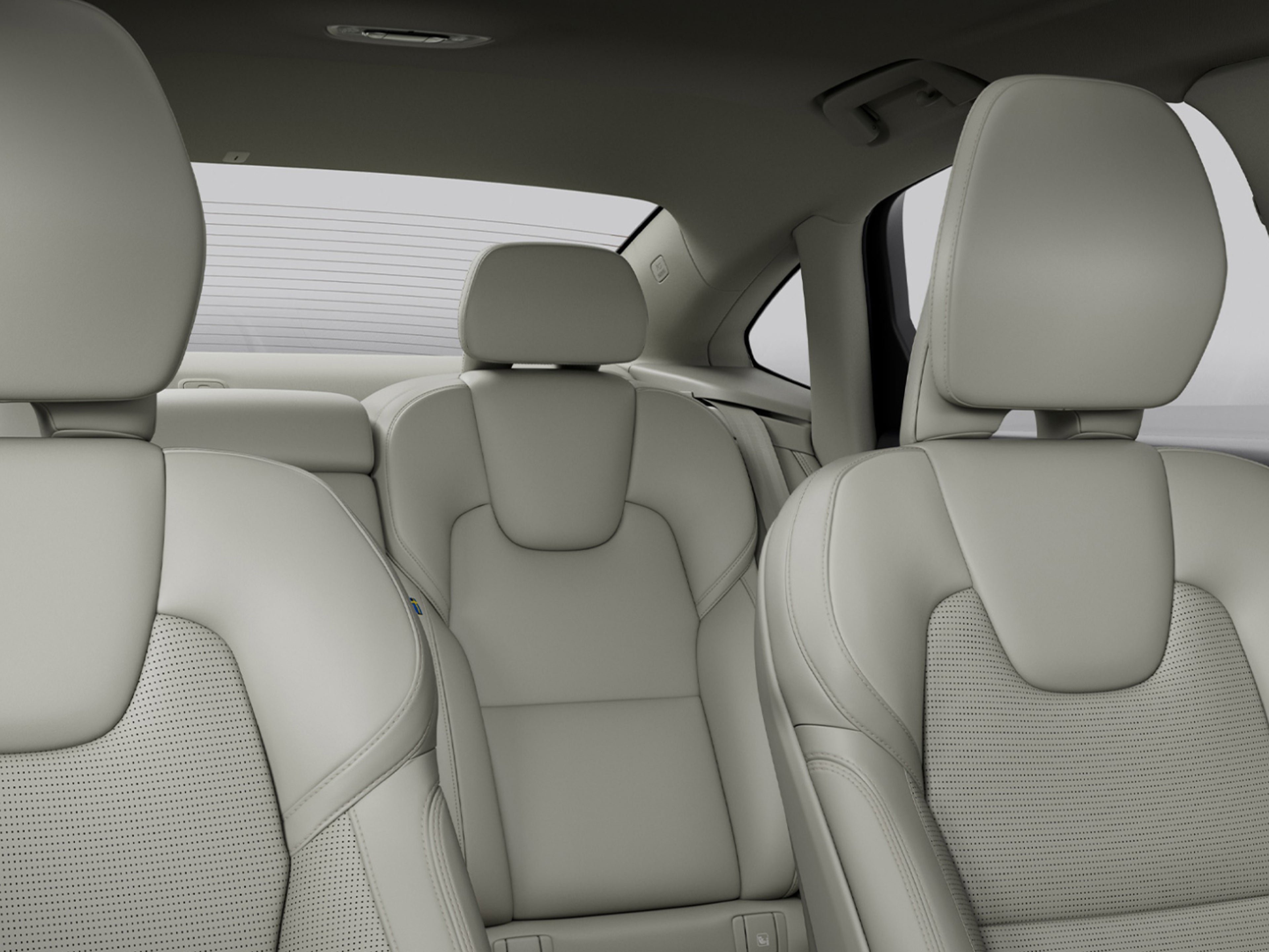 Cabin interior of Volvo S90 sedan.