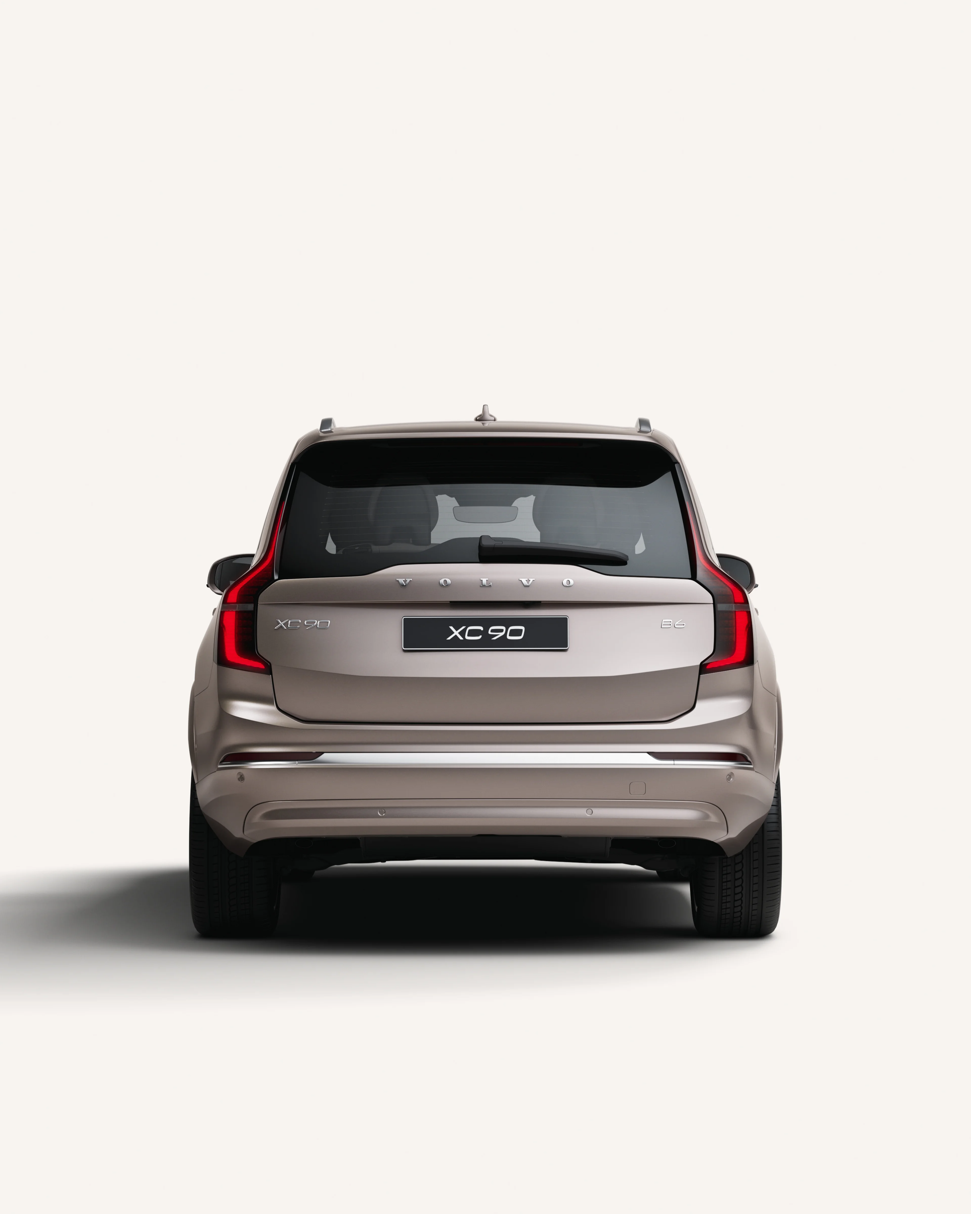 Rear view of the Volvo XC90 in a white studio environment.