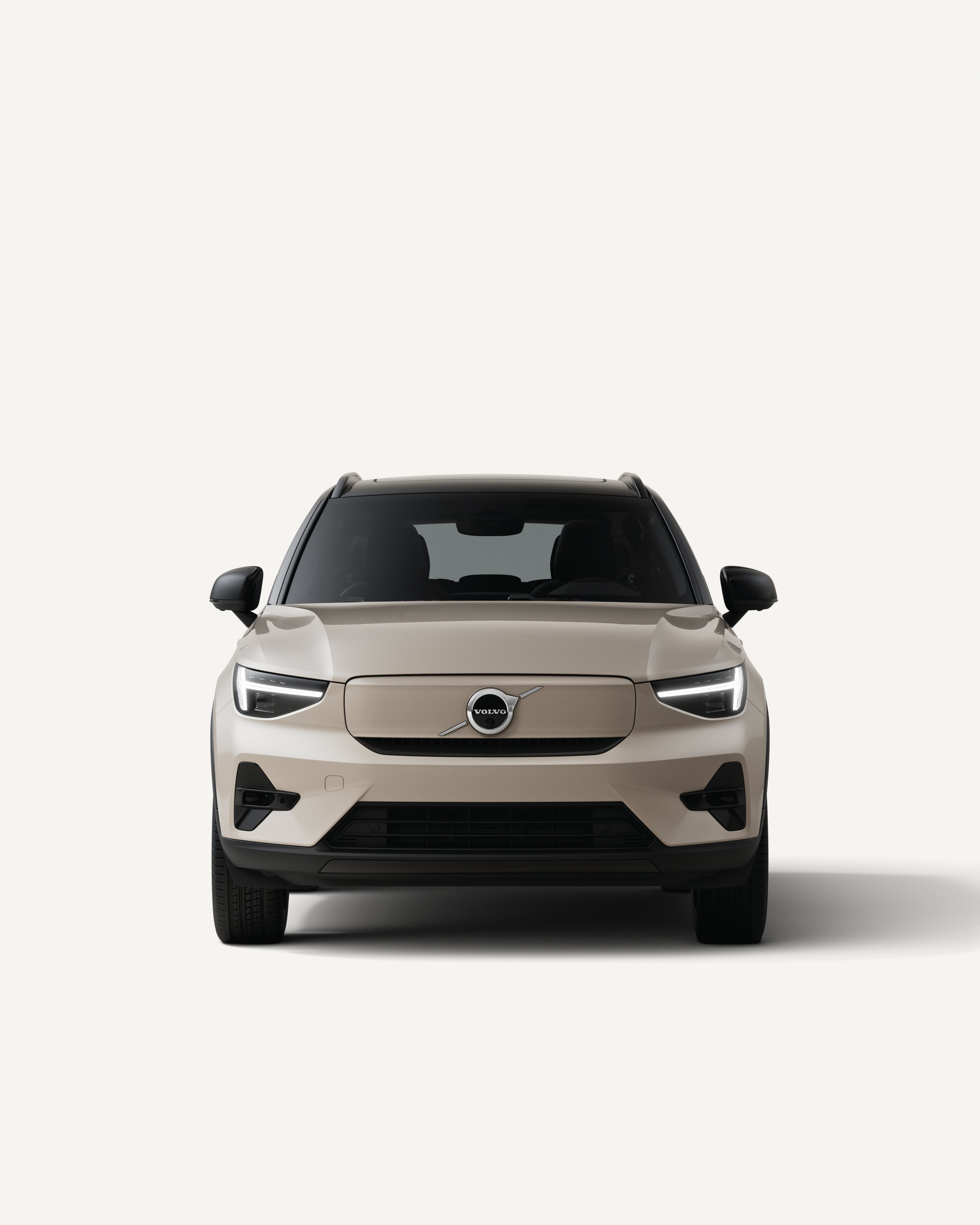 Front view of the Volvo EX40 in a white studio environment.
