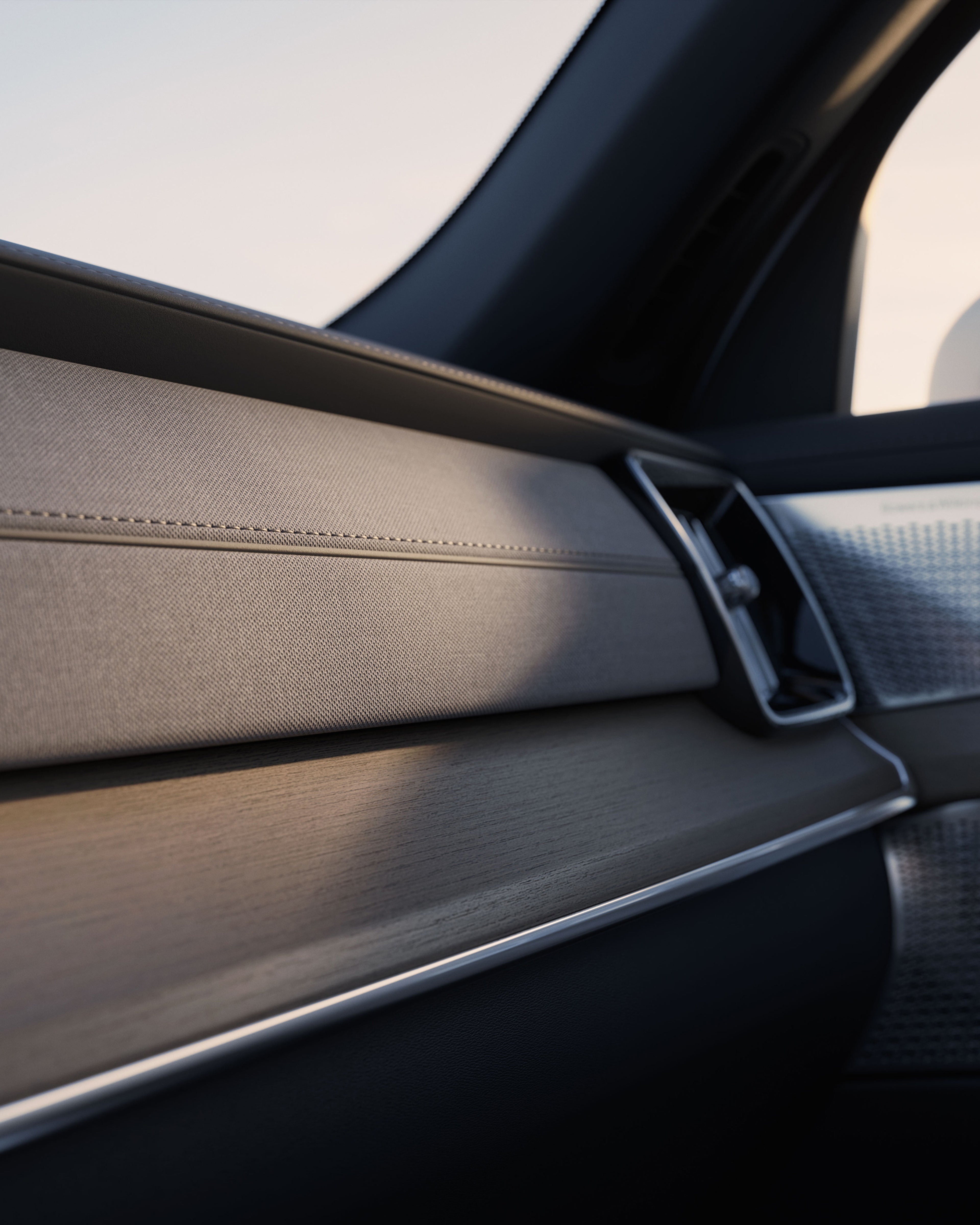 Close-up of the Volvo XC90 dashboard showcasing the minimalistic decor and subtle illumination
