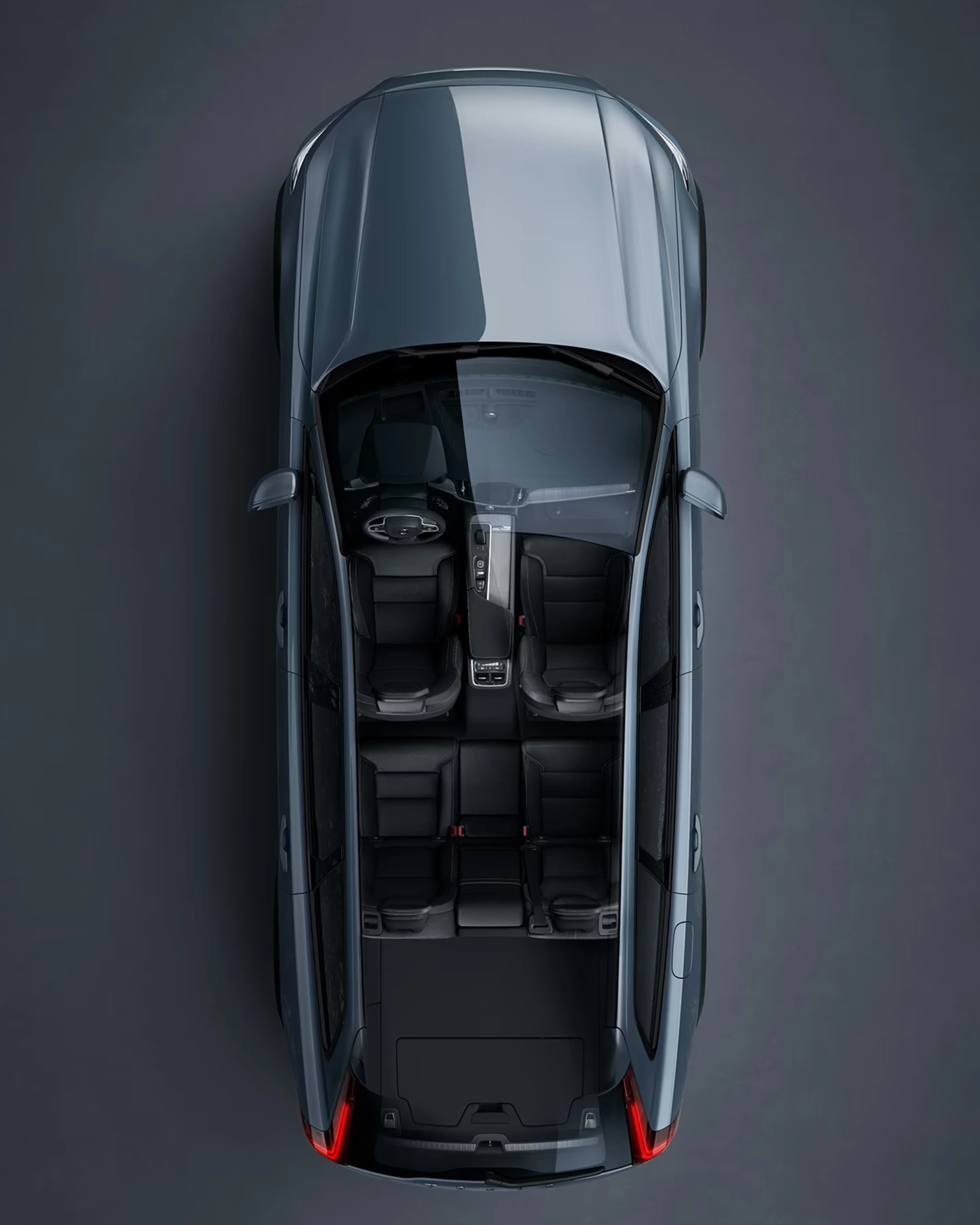 Volvo V60 Cross Country grise, vue du dessus avec l'intérieur visible.
