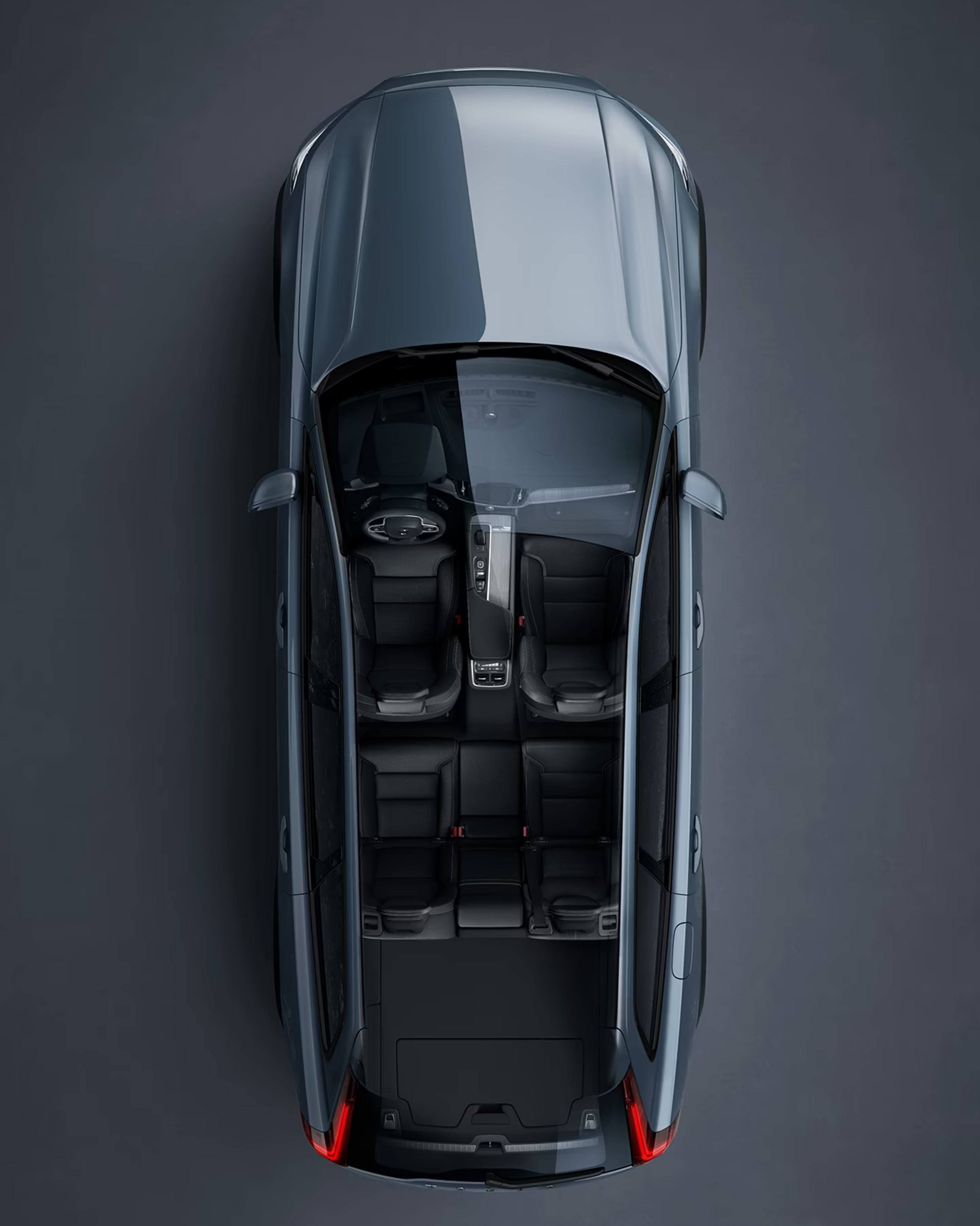 A gray Volvo V60 cross country seen from directly above with interior visible.