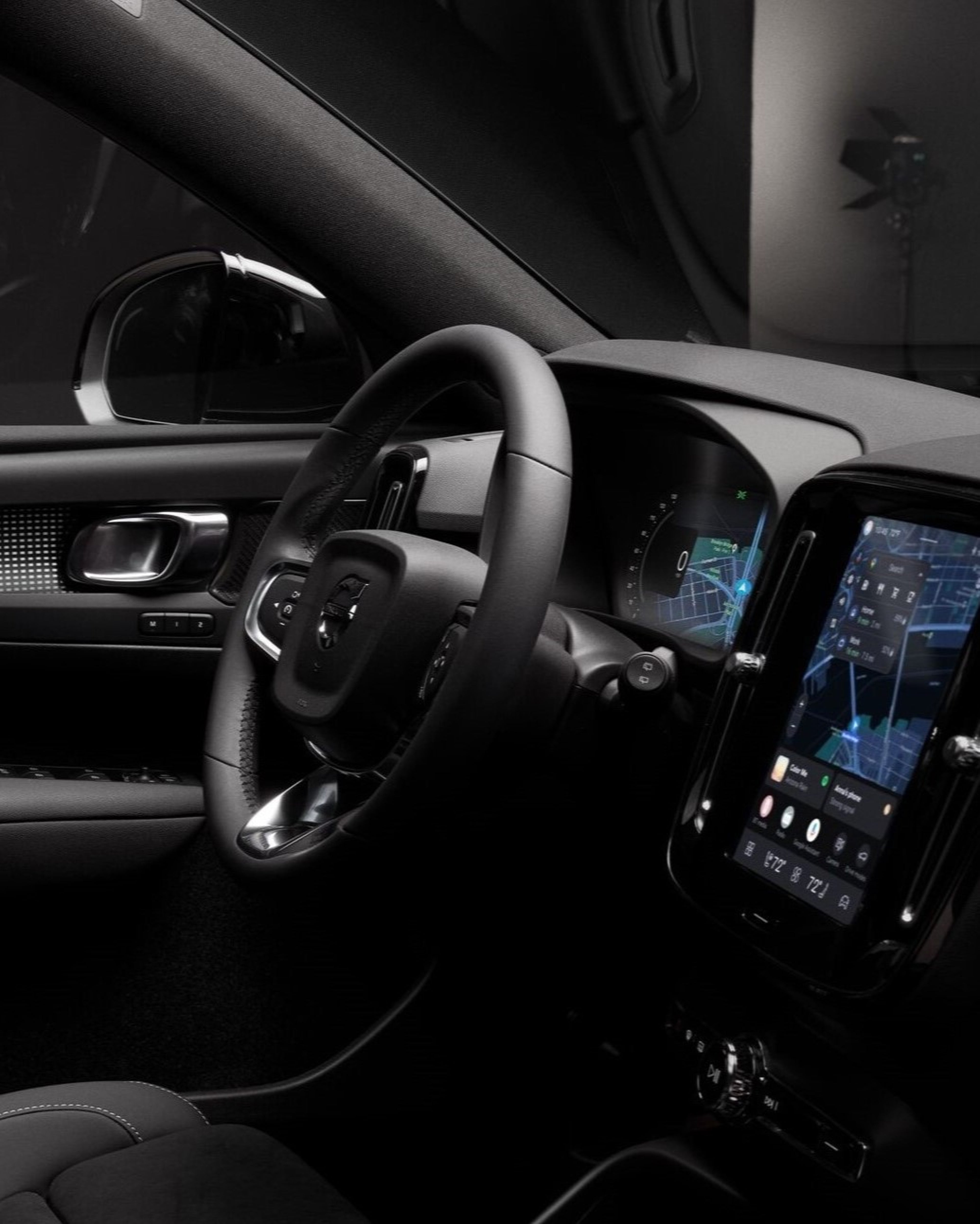 Front angle of Volvo EX40 Black Edition in a studio