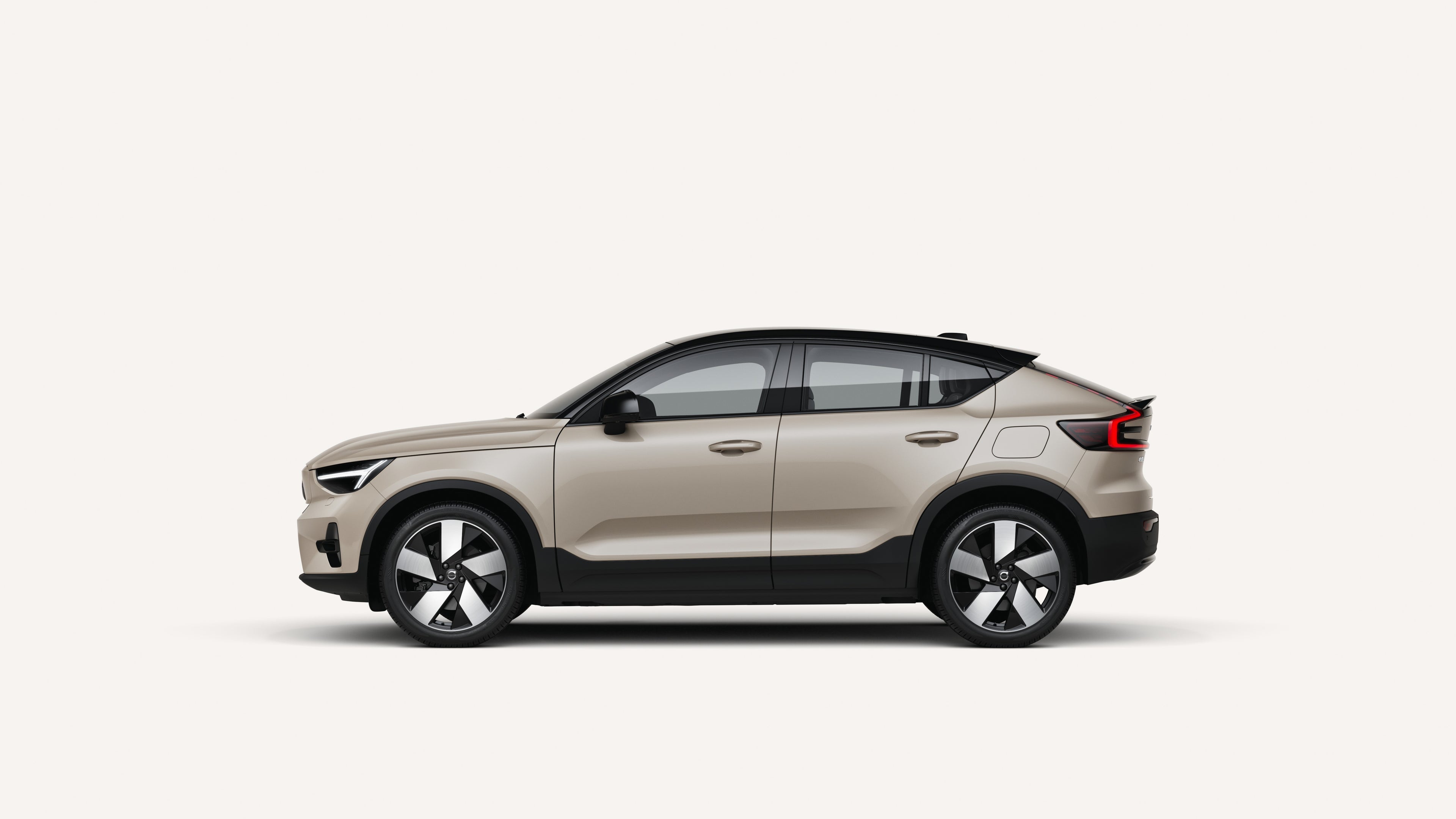 Side view of the Volvo EC40 electric in a white studio environment.