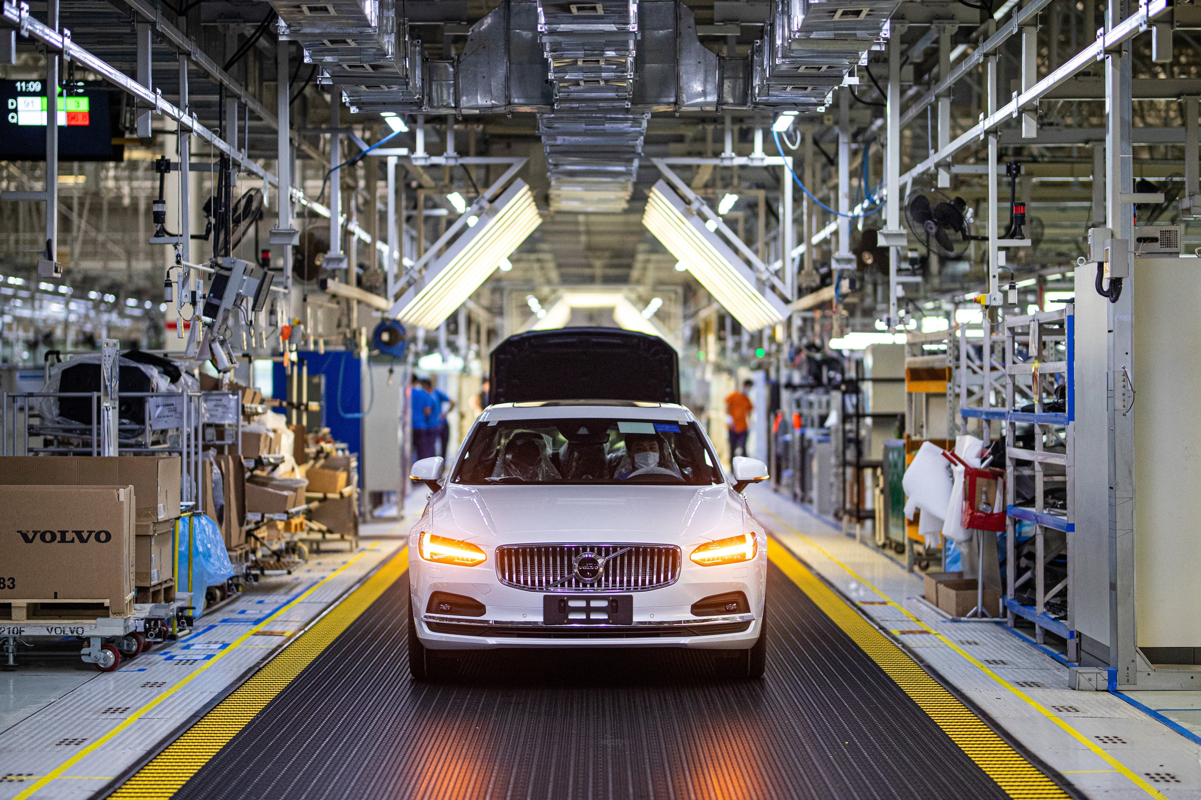 White Volvo S90 on the production line at Volvo Cars manufacturing plant in Daqing, China.