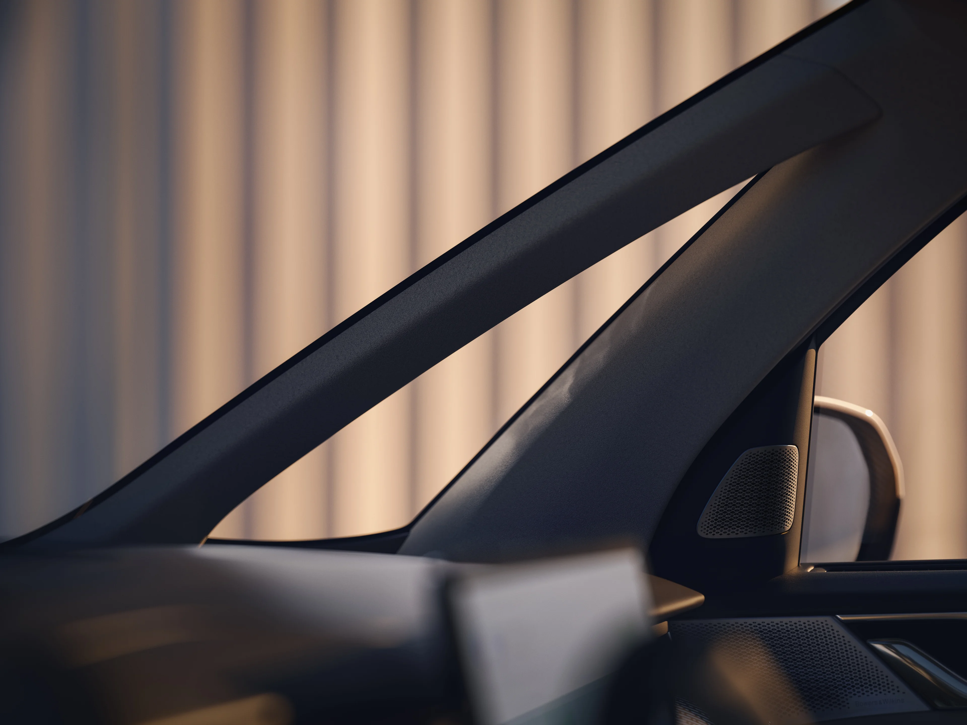 A rendered view of Volvo EM90 showing in-built speaker and side mirror