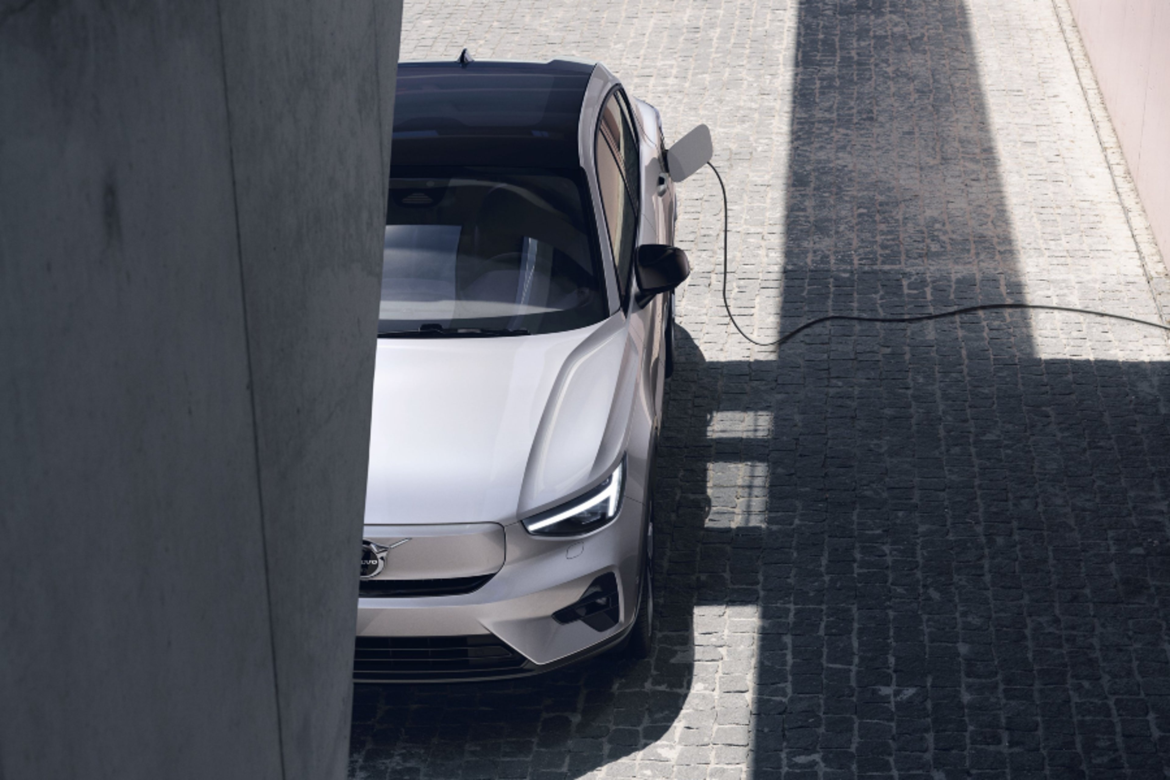 Electric car being charged