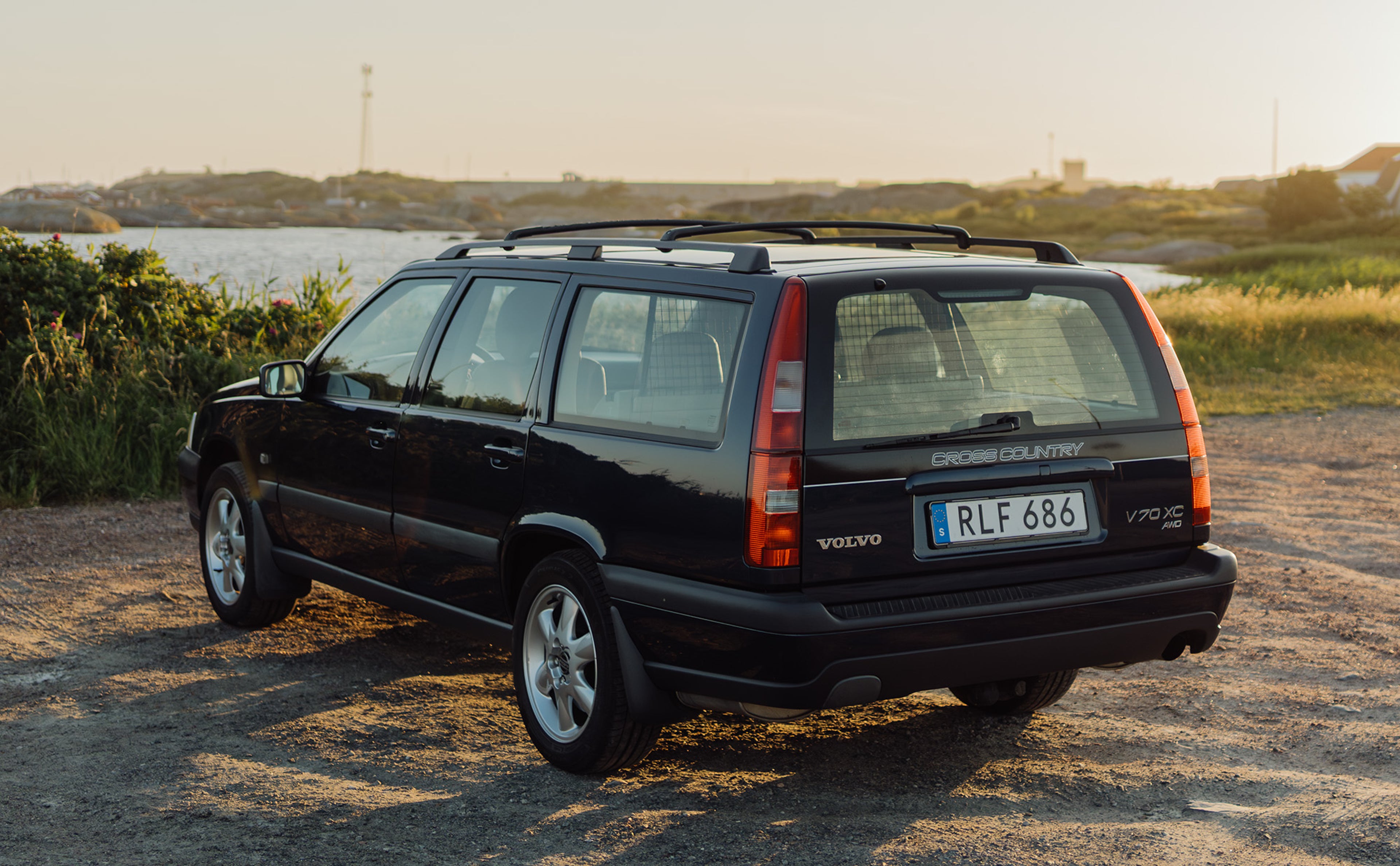 Heritage Volvo V70 Cross Country exterior rear view showcasing rugged design, stylish body, and all-terrain capability.