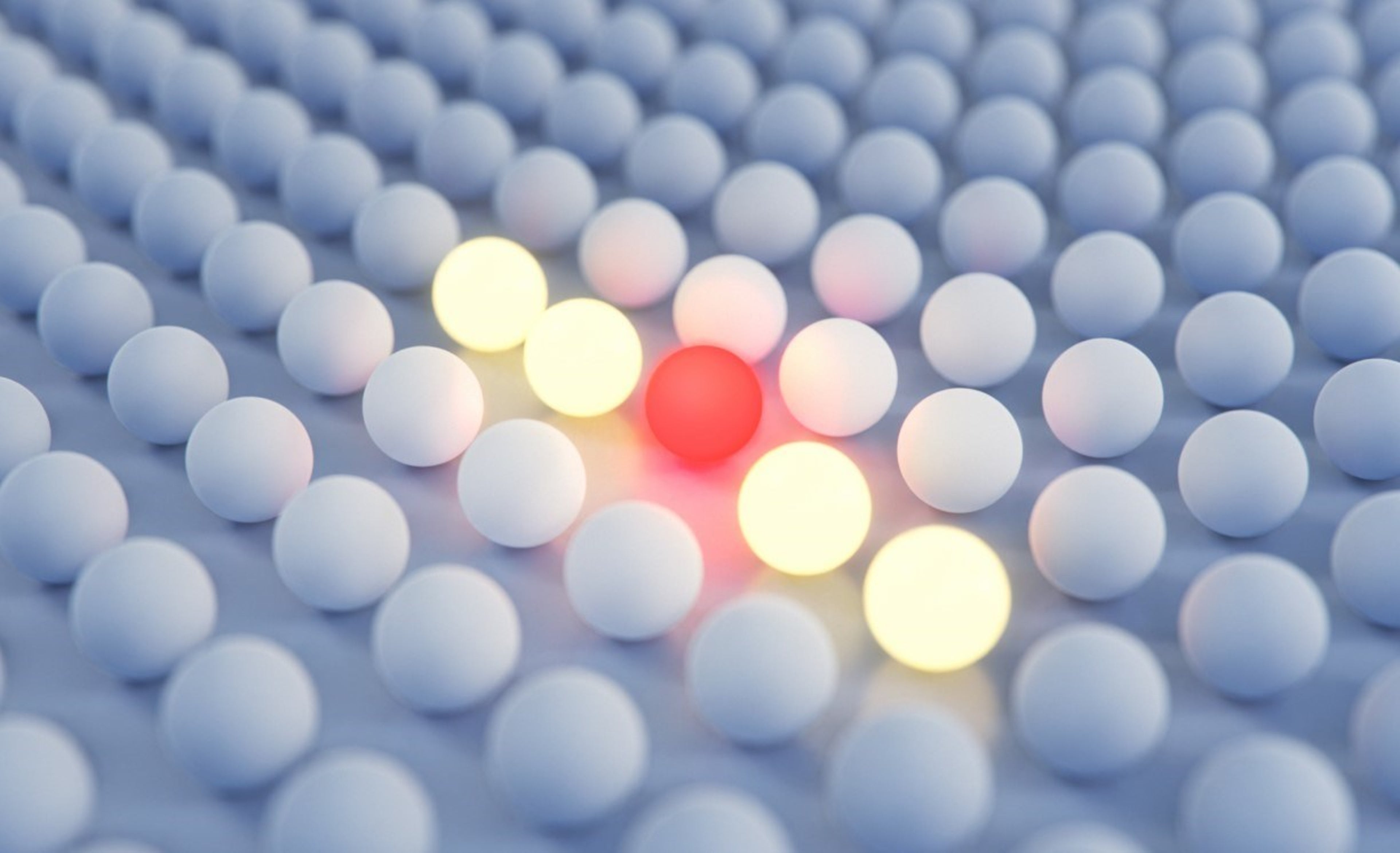 leuchtende Kugeln in Reihen angeordnet