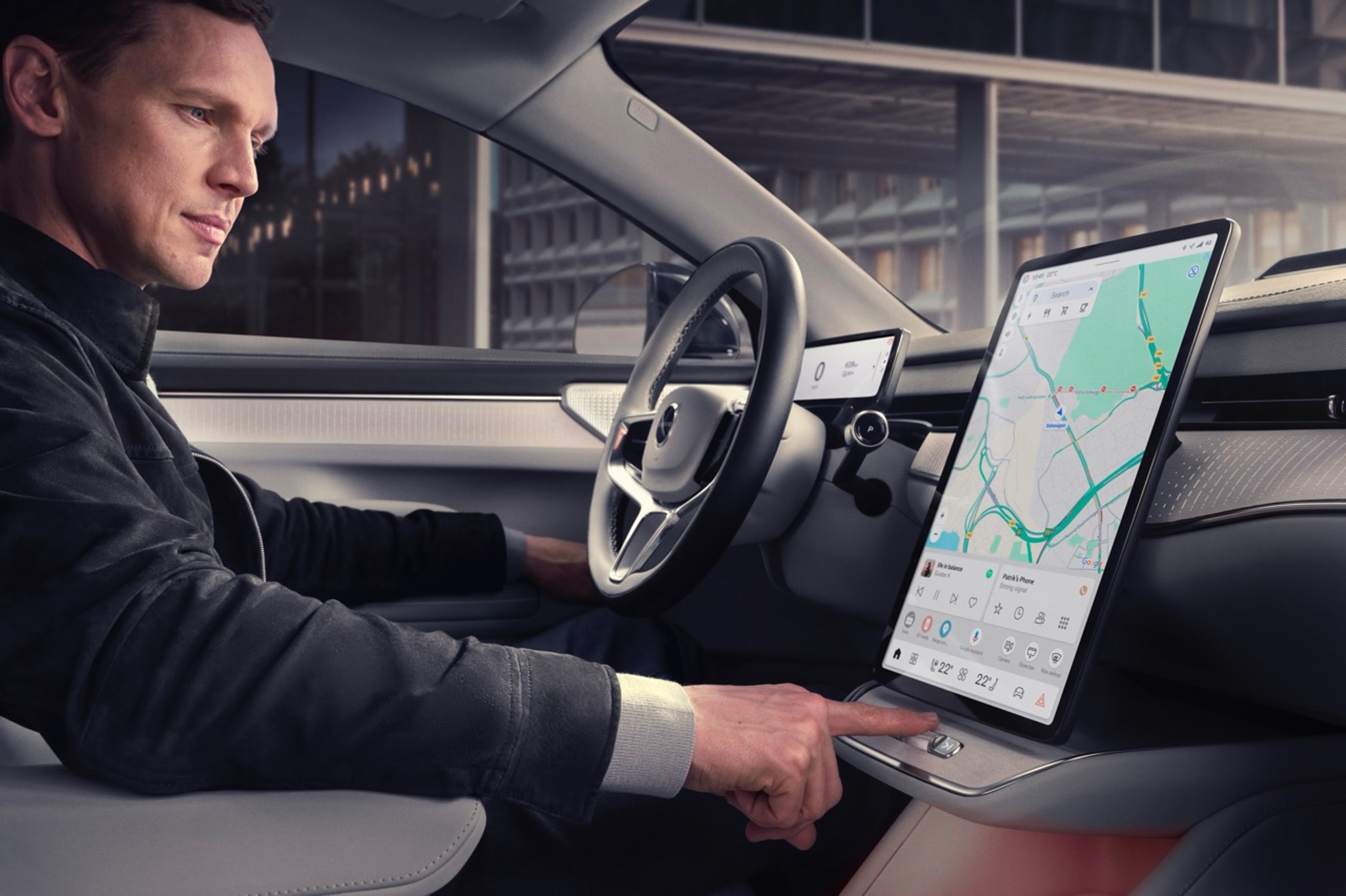 A company car driver interacts with a large touchscreen navigation display inside a Volvo ES90.