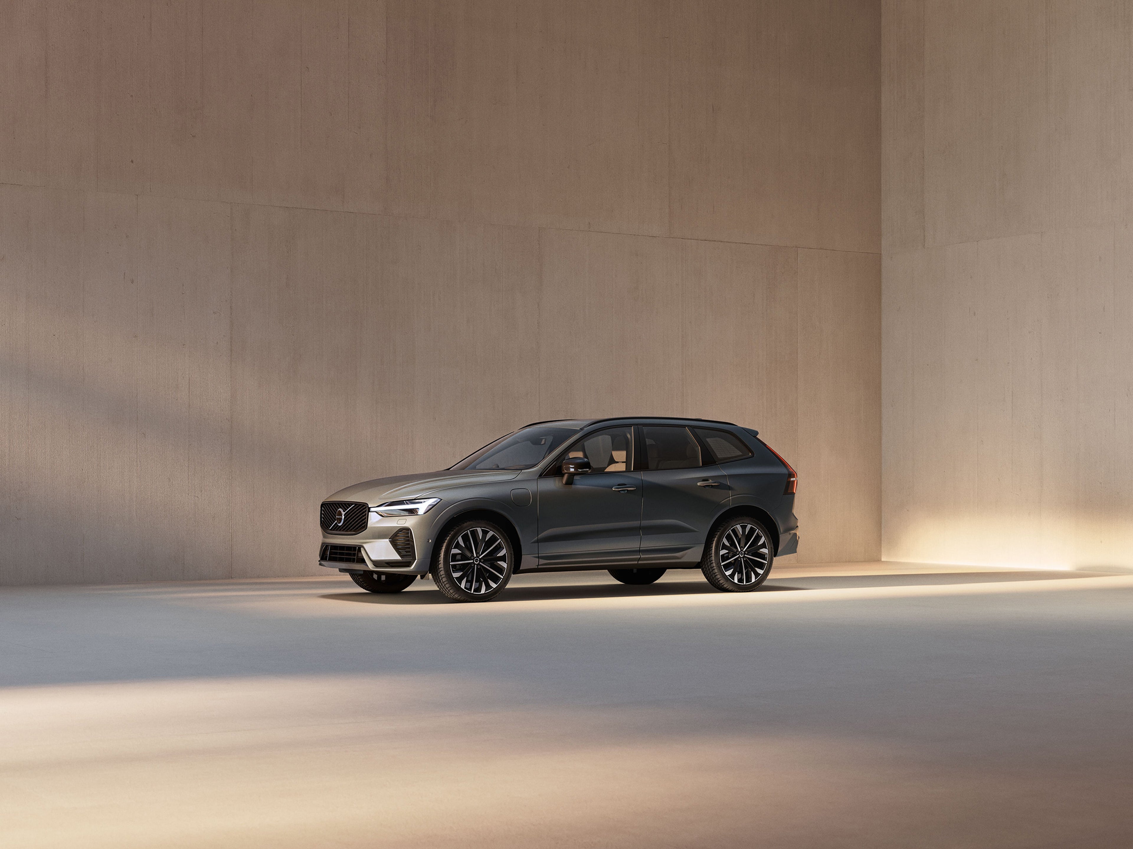 A refreshed Volvo XC60 SUV, highlighting its updated exterior features and contemporary design.