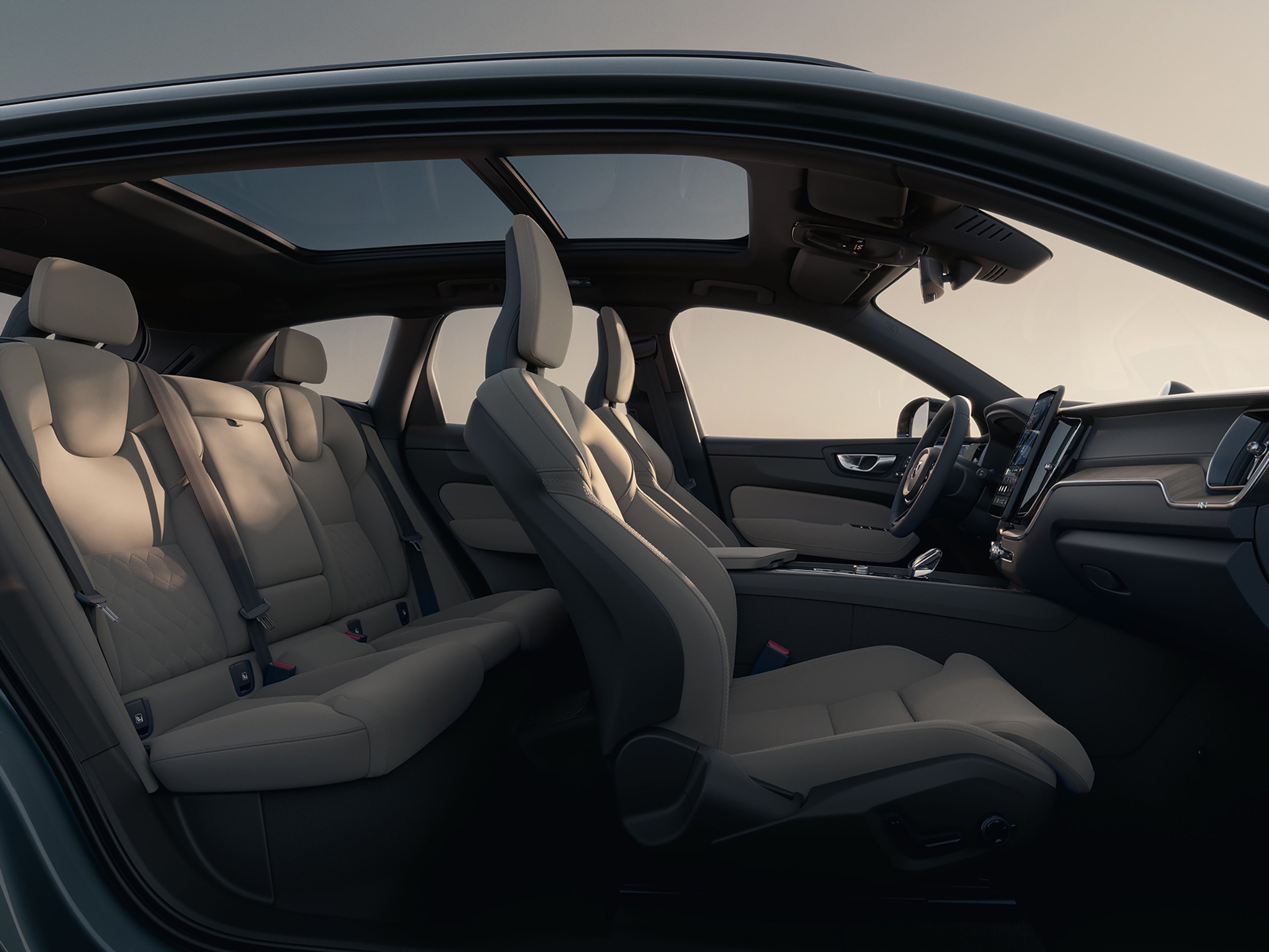 The interior of the updated Volvo XC60, displaying the refined dashboard, high-quality materials, and advanced infotainment system.