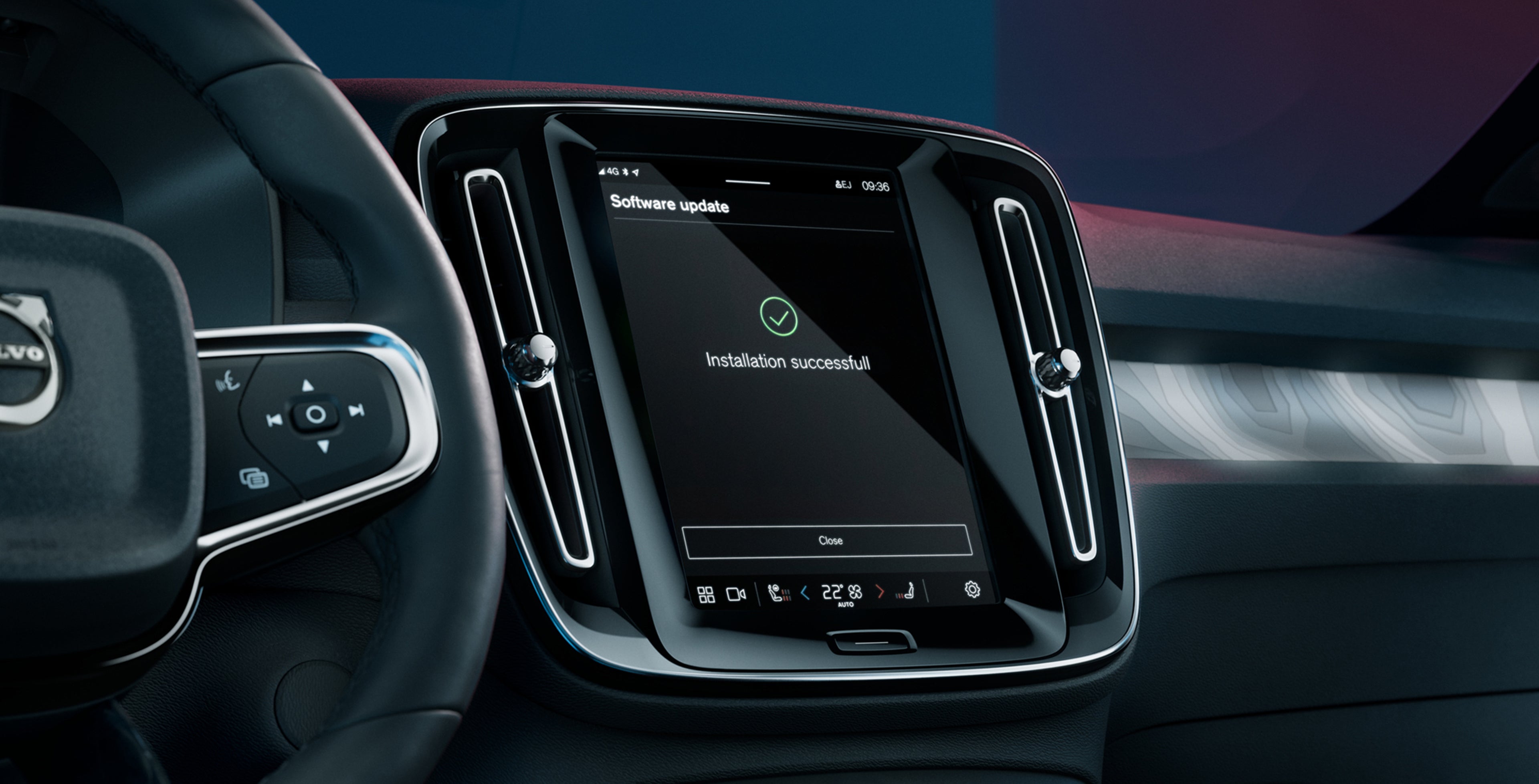 Kojelaudan näyttö, jossa viestitään päivityksen onnistuneesta asennuksesta.