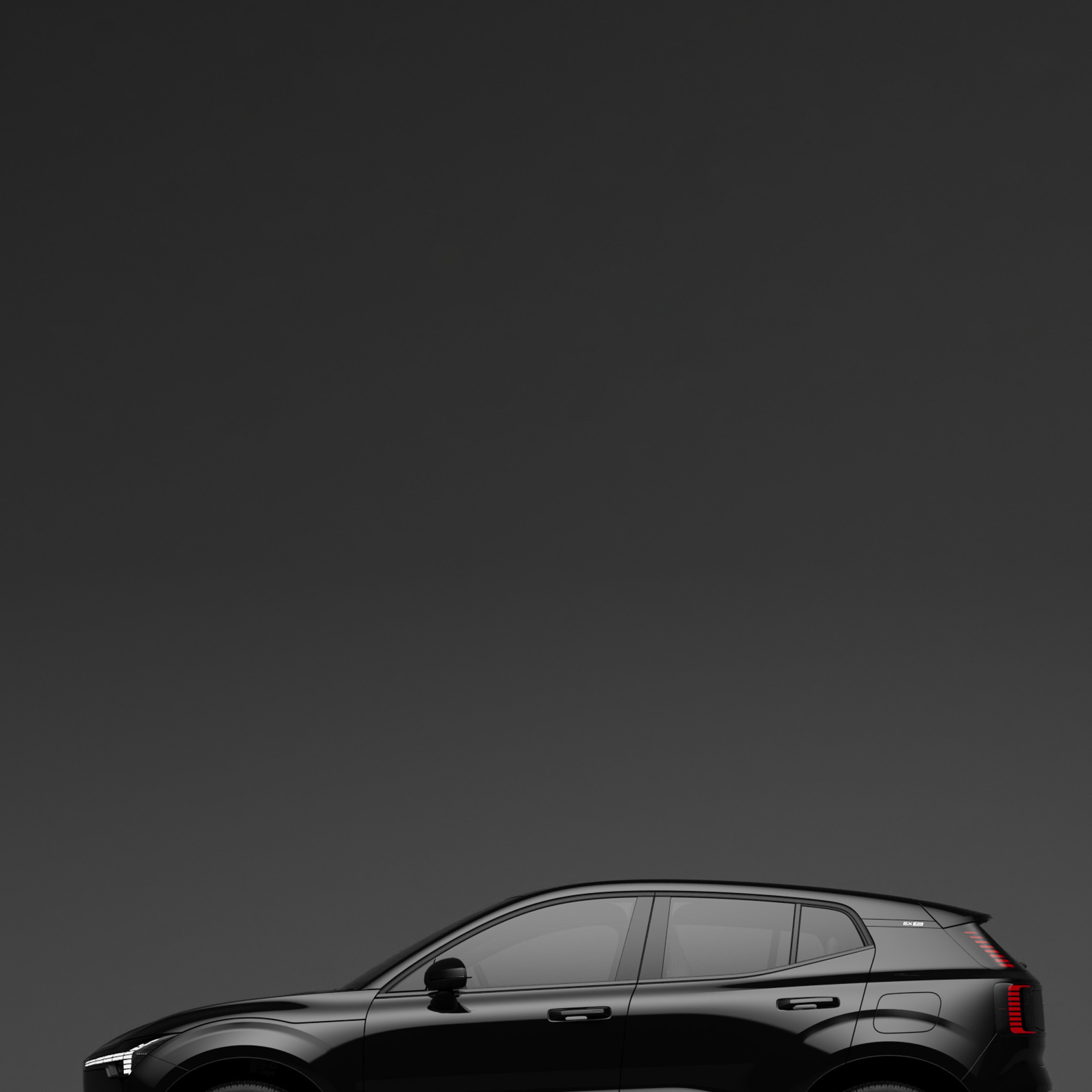 Side profile of the fully electric Volvo EX30 SUV in onyx black cropped in half.