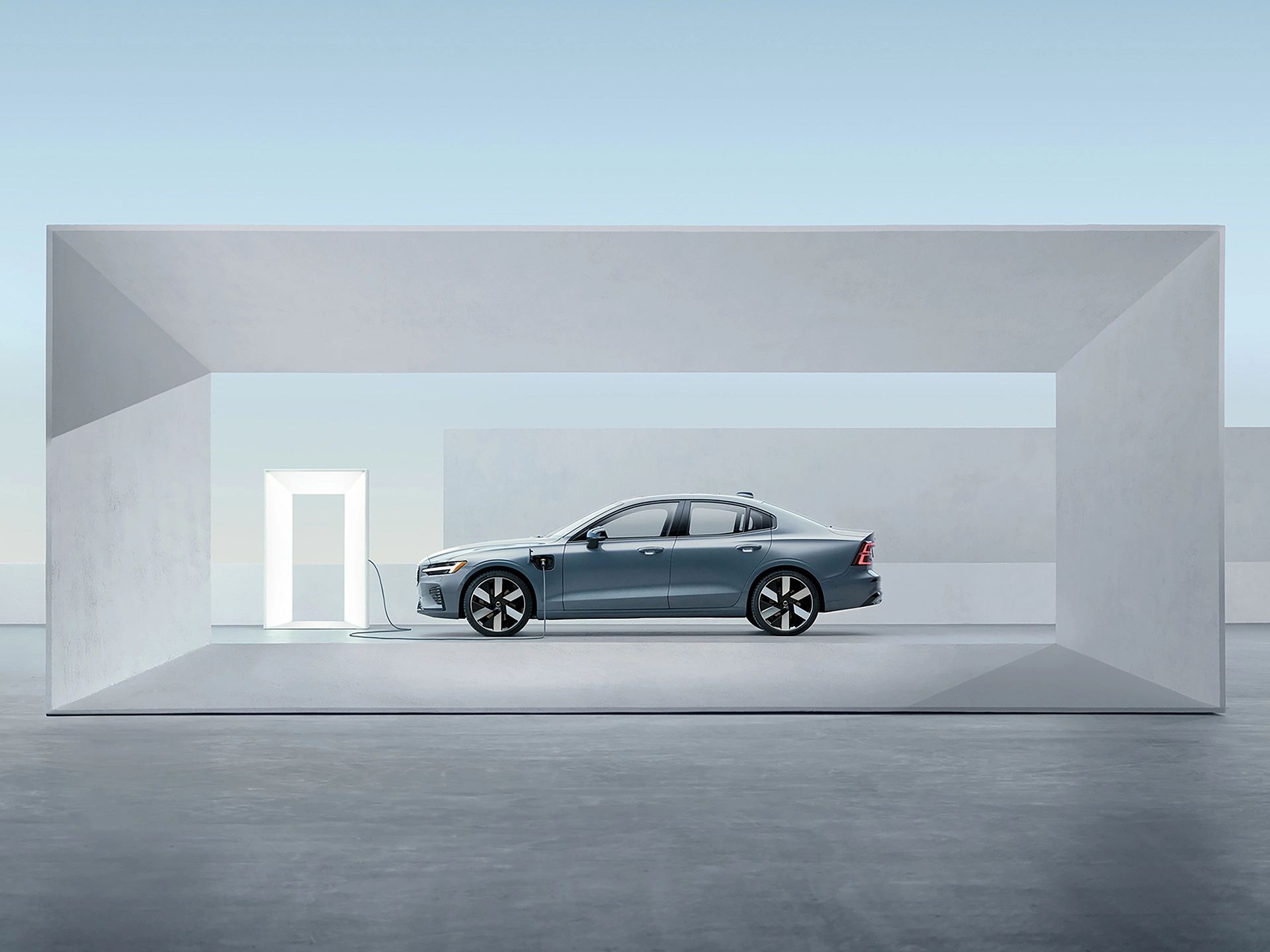 Side view of Volvo S60 Recharge plug-in hybrid charging 