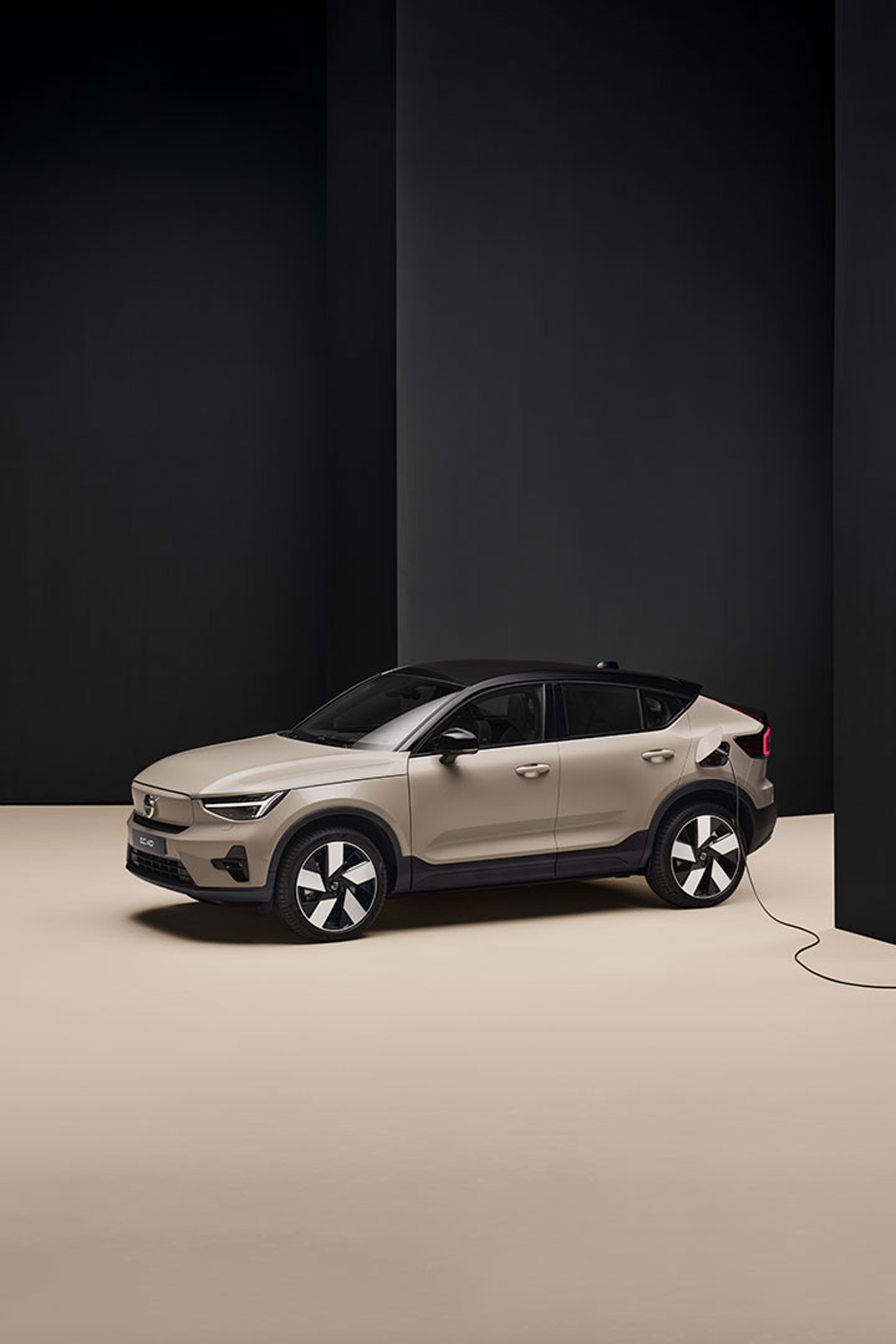 A fully electric Volvo EC40 plugged in to charge.