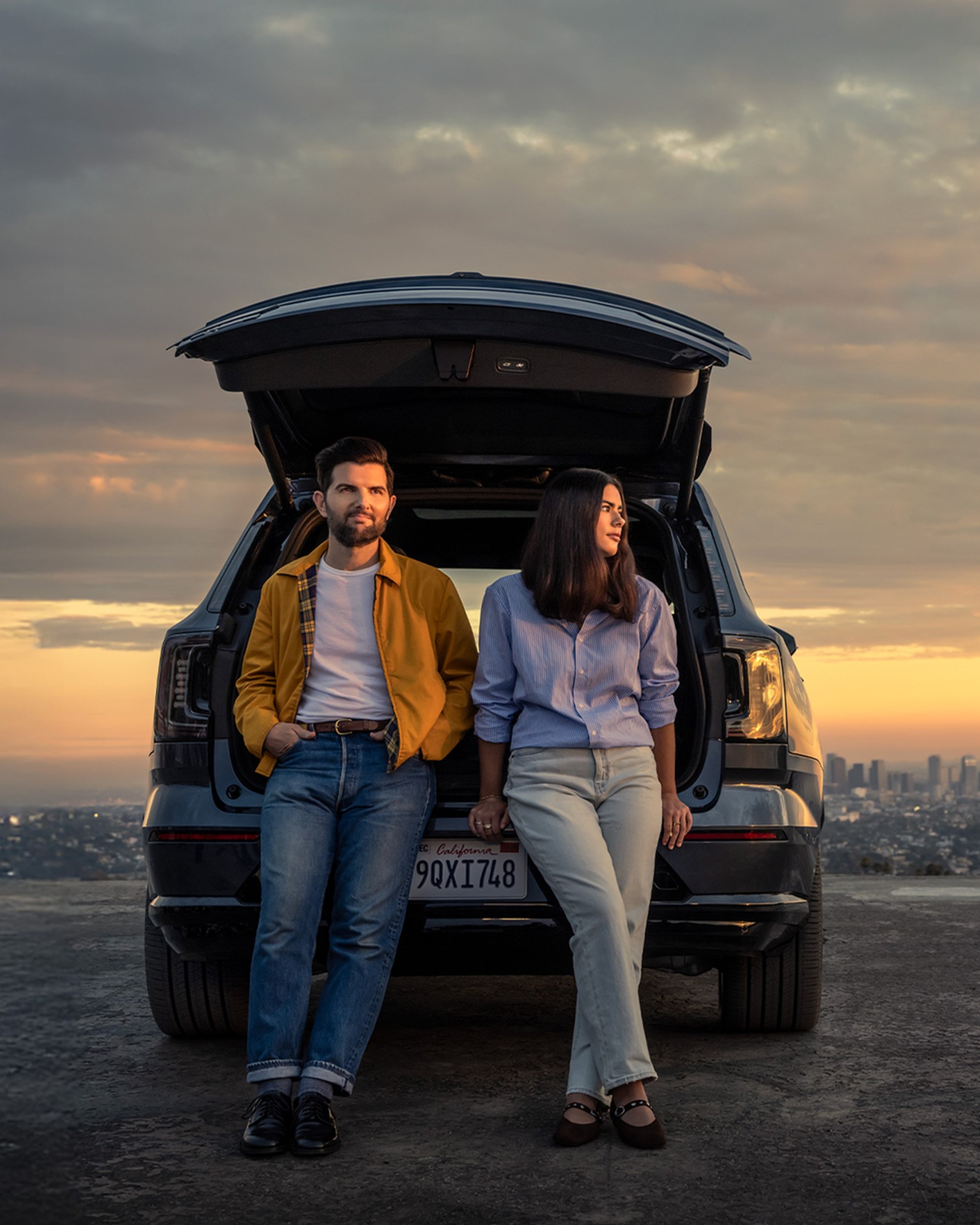 Volvo Stories - Two People Sitting with Volvo EX90