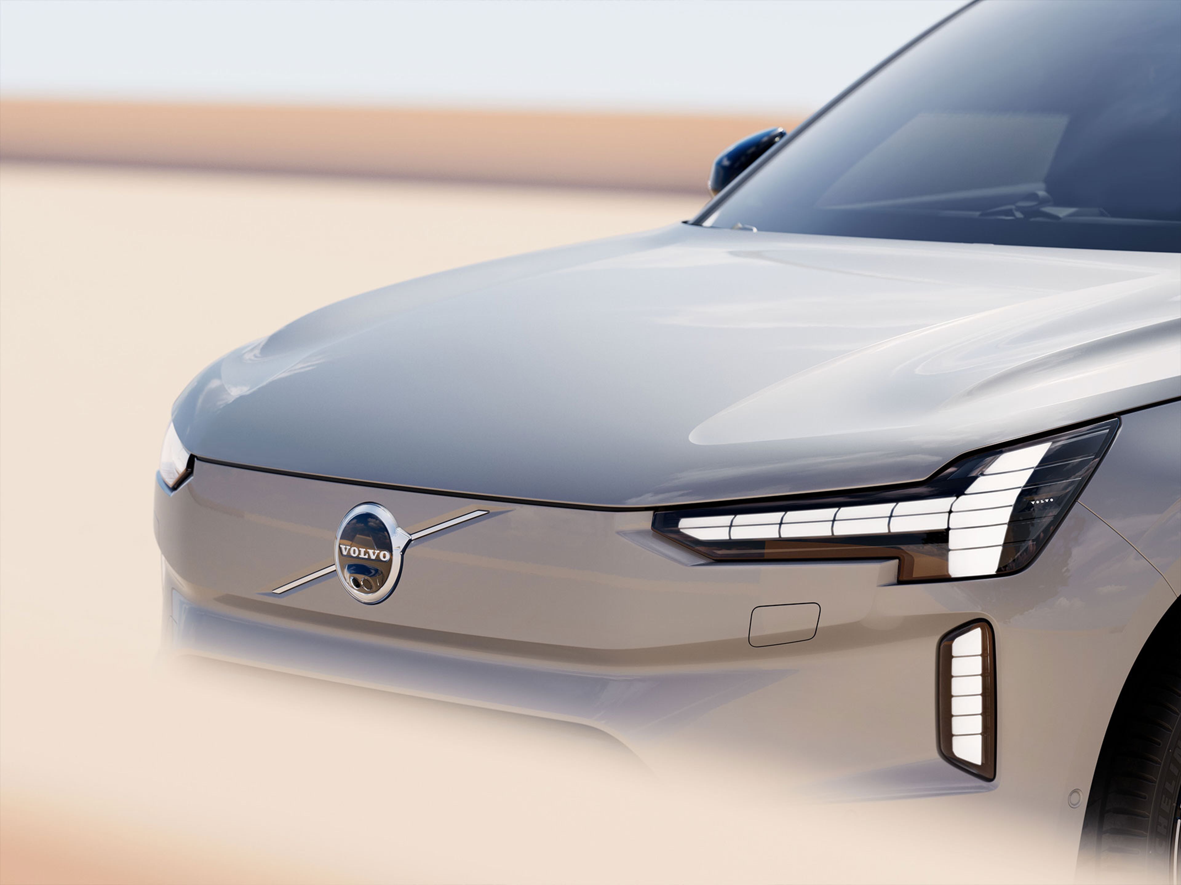 Las luces delanteras en forma de martillo de Thor y el escudo de colores a juego de un Volvo SUV totalmente eléctrico.