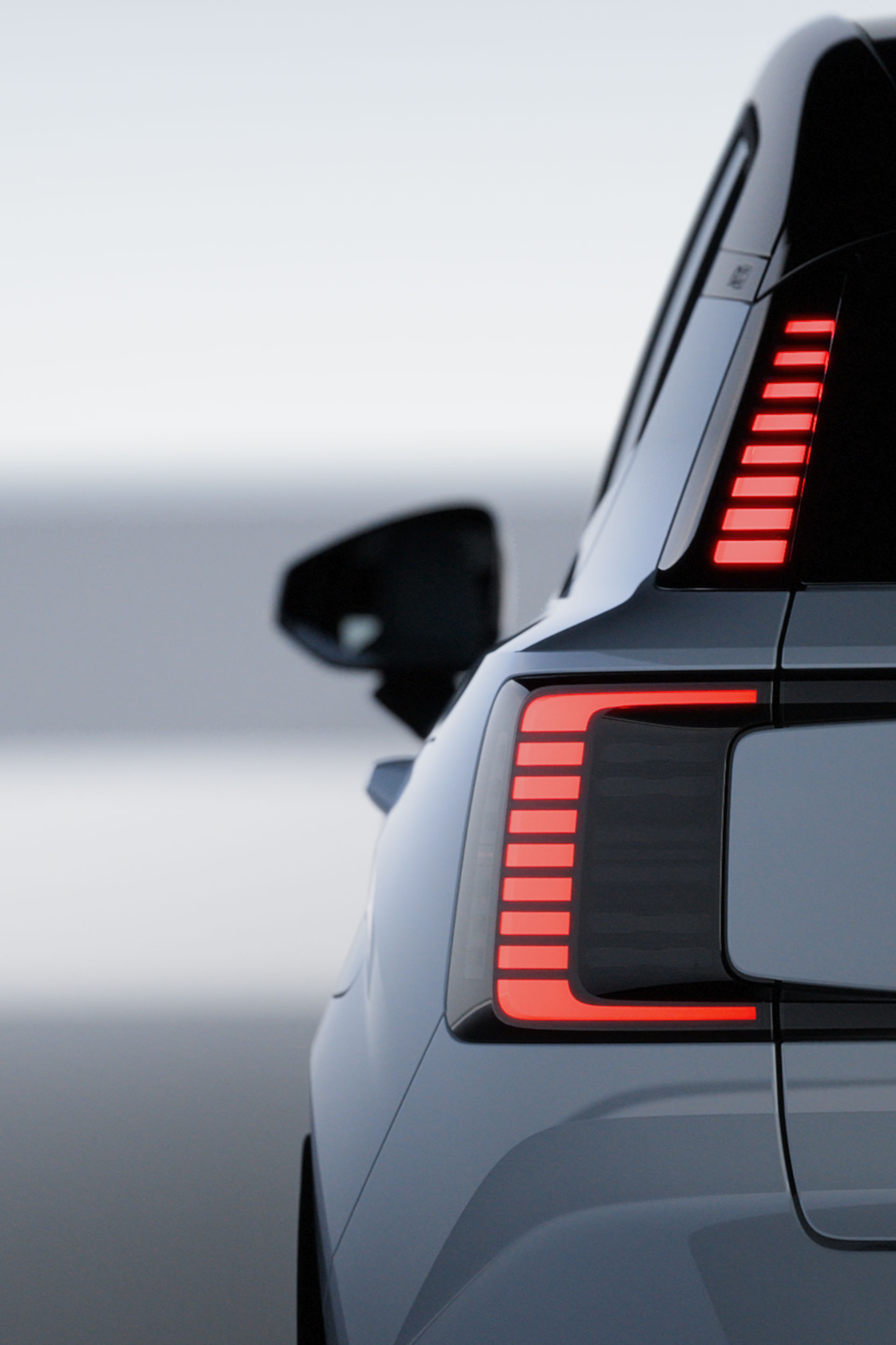 The exterior of a Volvo EX30 with a partial view of the front.