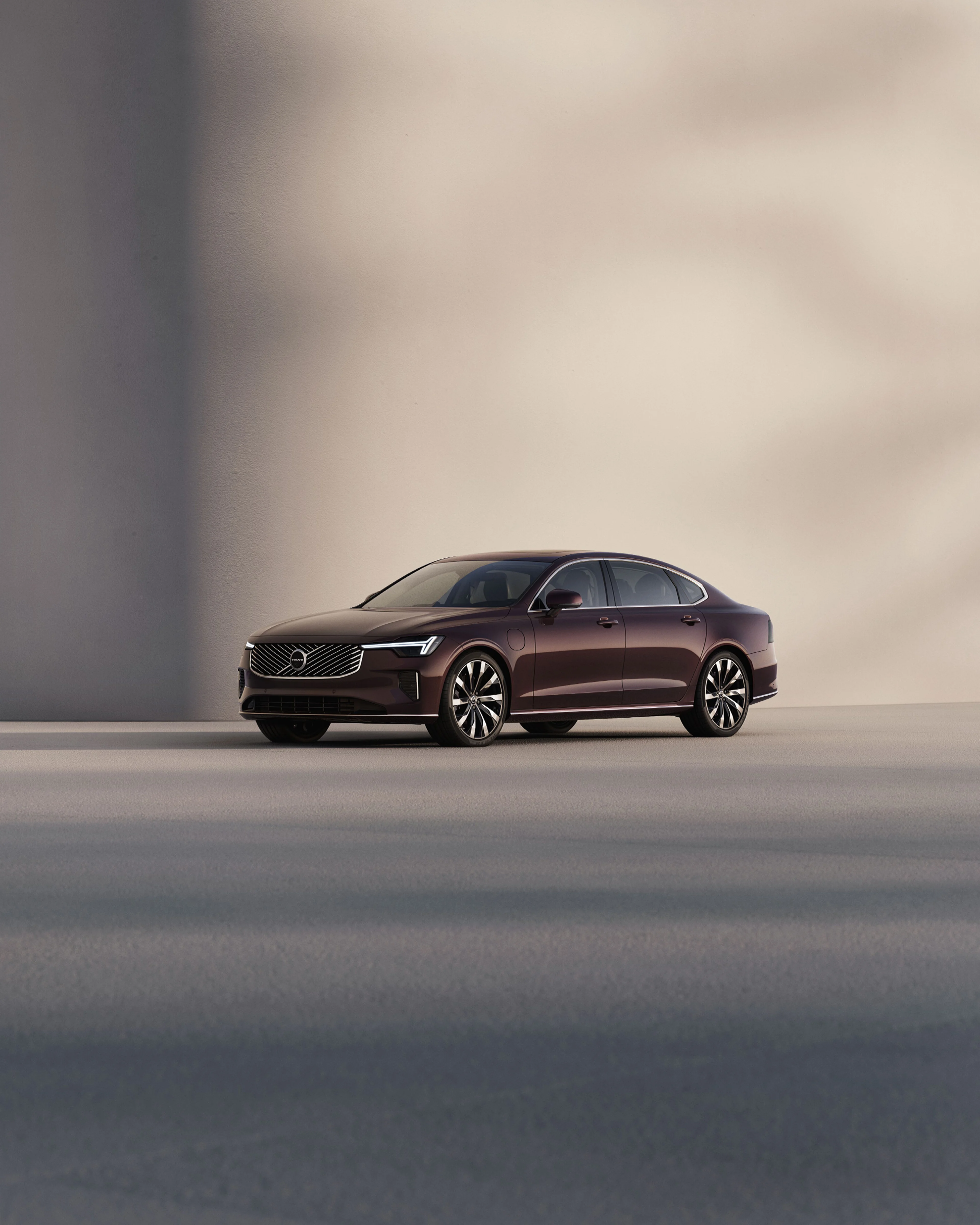 The side profile of a Volvo S90 sedan.