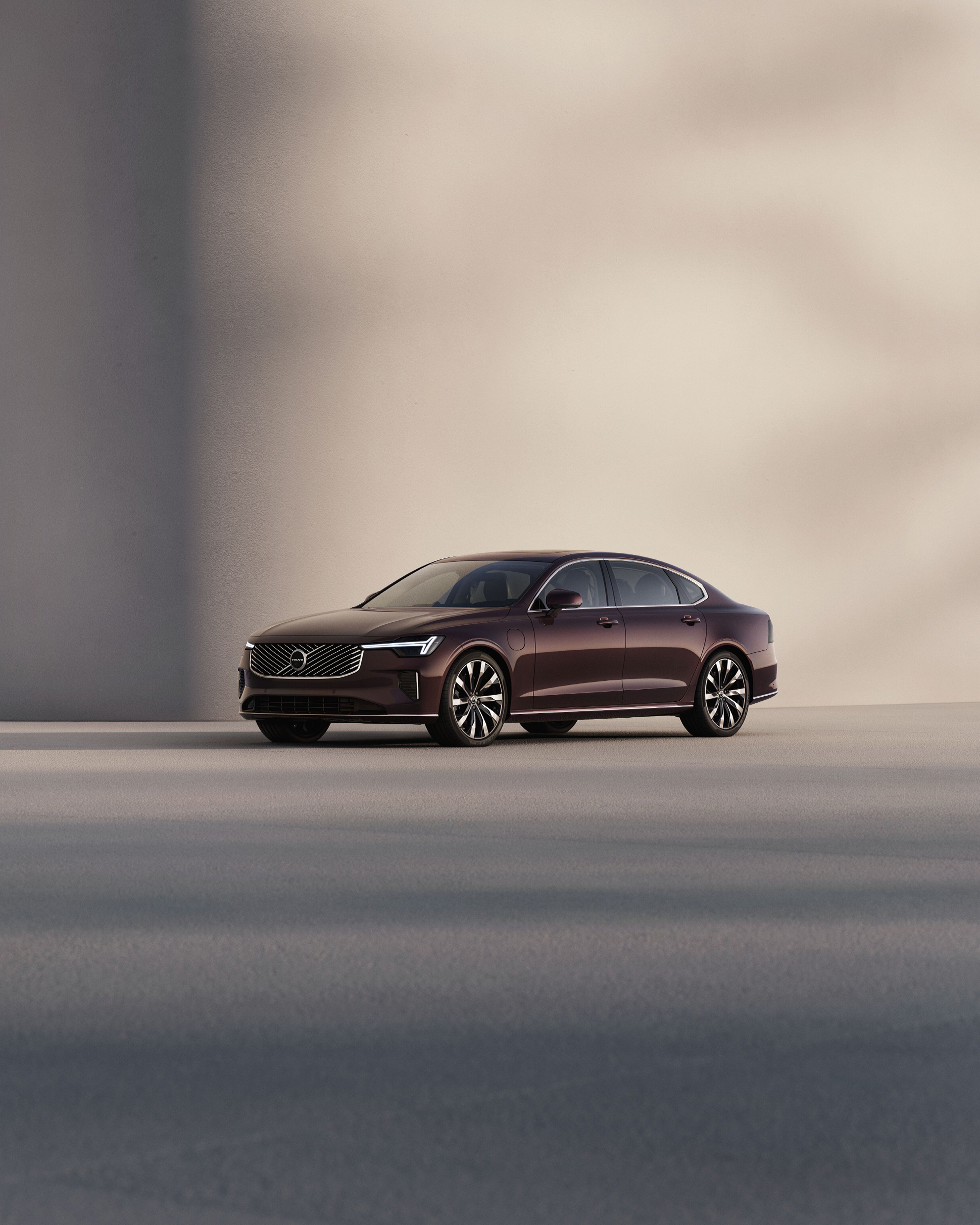 The side profile of a Volvo S90  sedan.