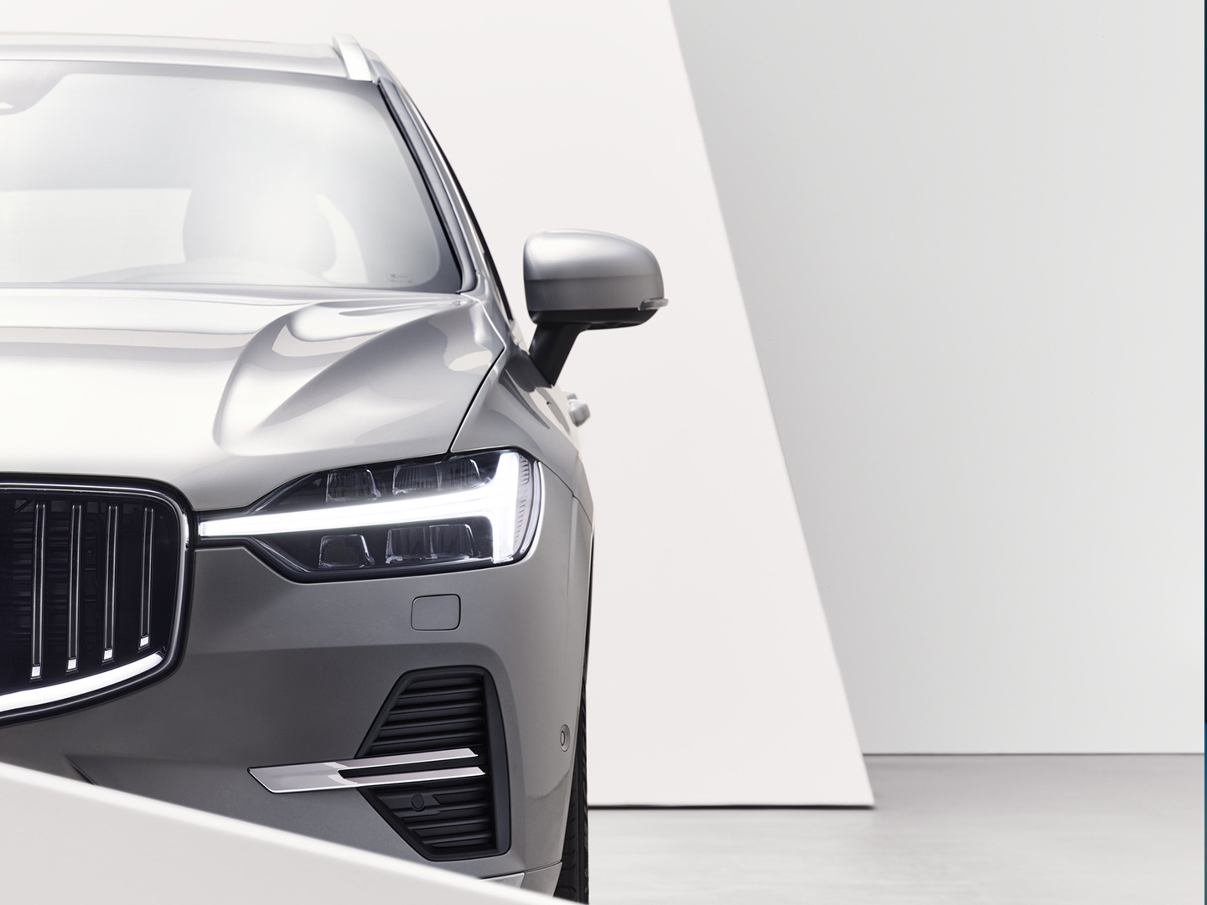 The front of a Volvo Recharge plug-in hybrid car.