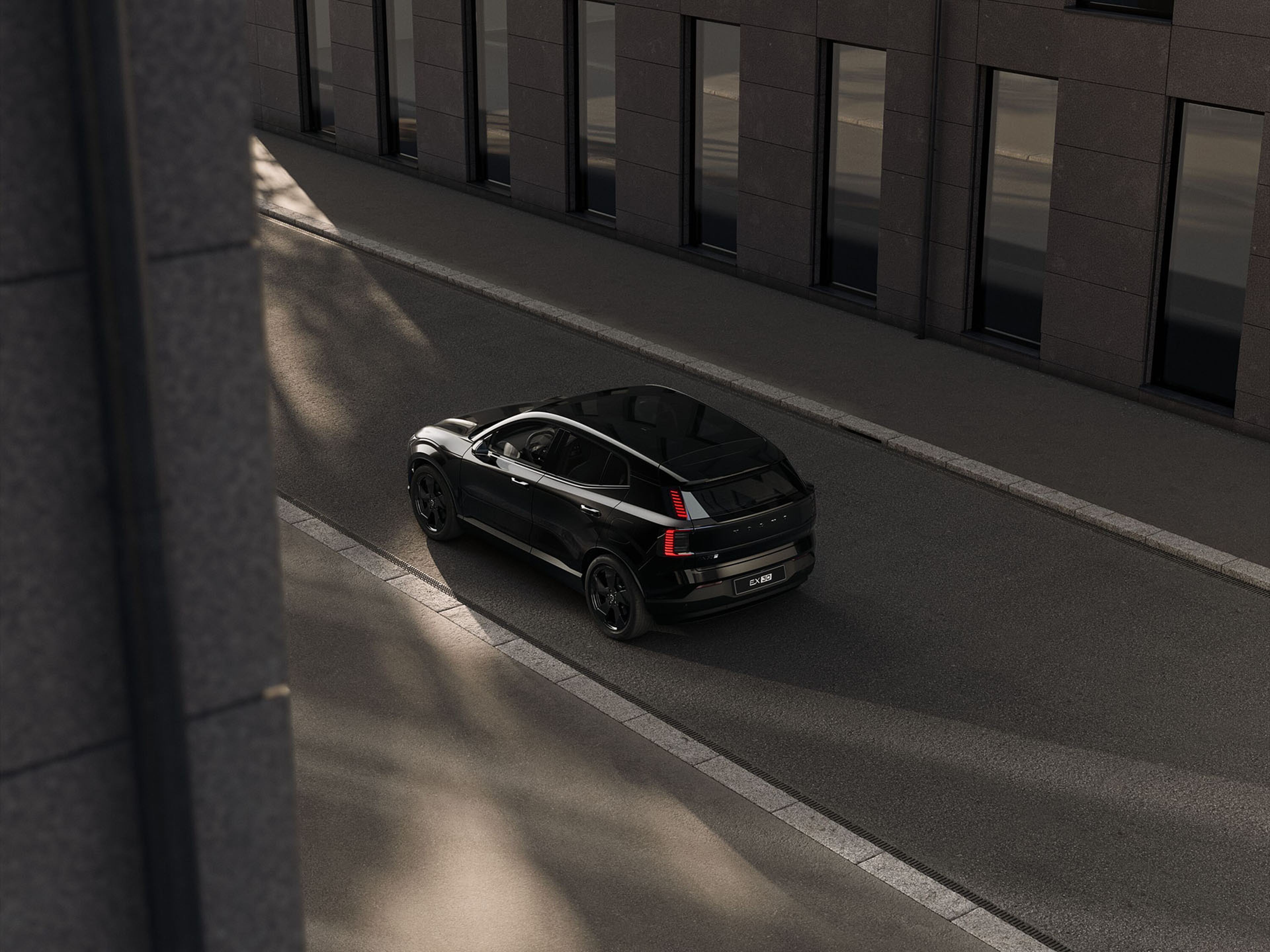 EX30 black edition a três quartos traseiro visto de cima.