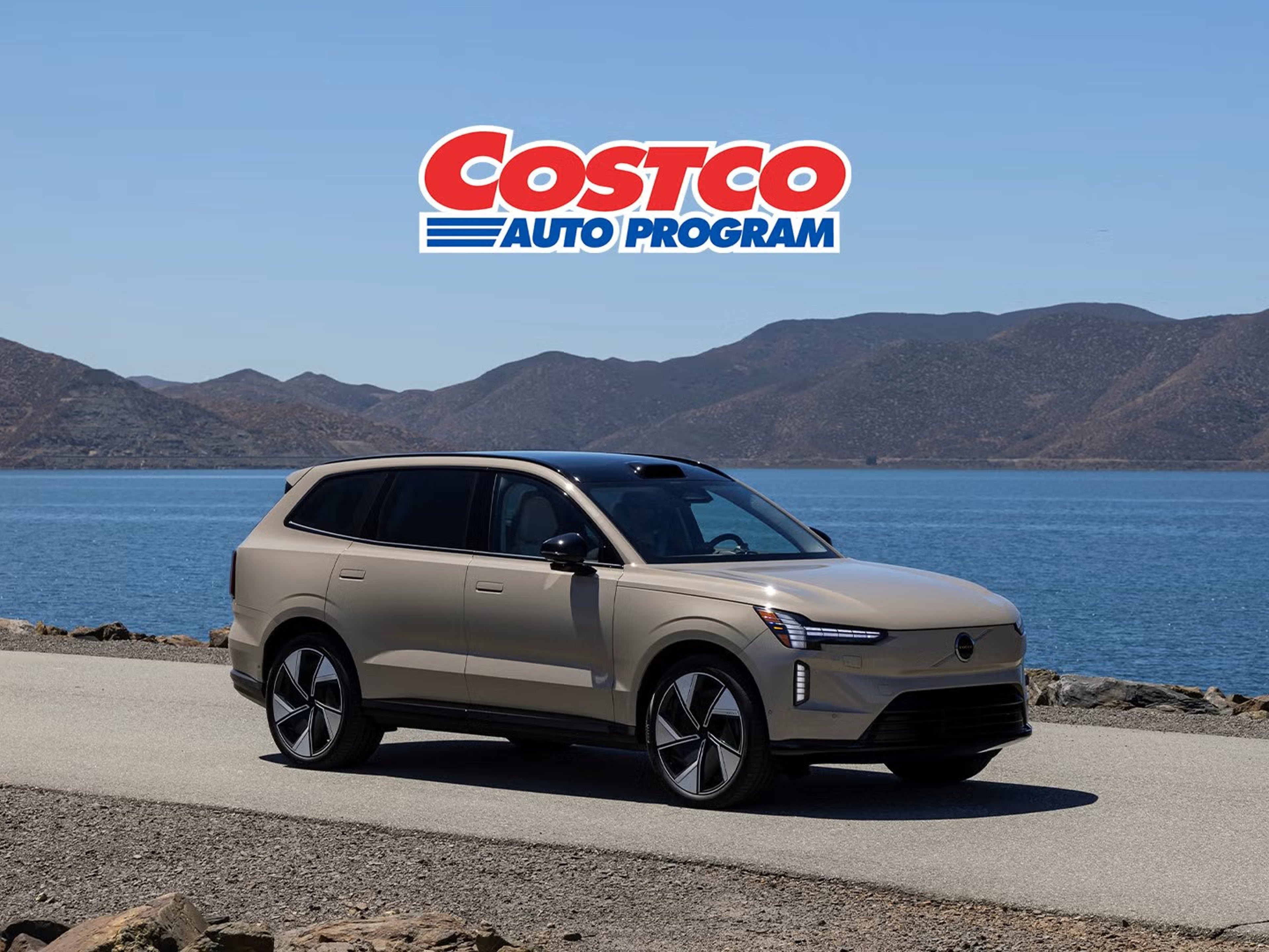 Volvo EX90 parked near water with Costco logo overlayed