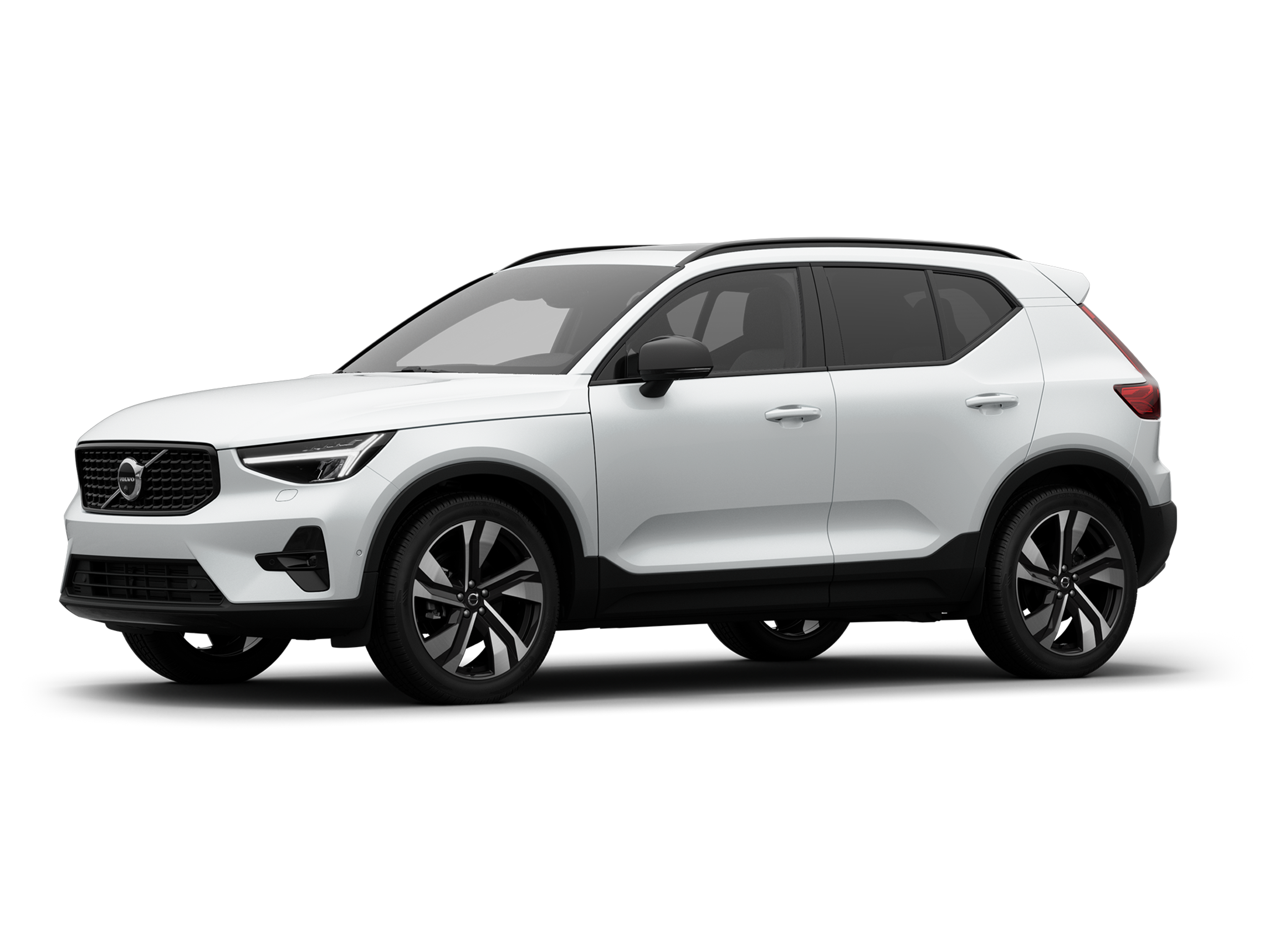 Crystal white -värinen Volvo XC40 kevythybridiauto.