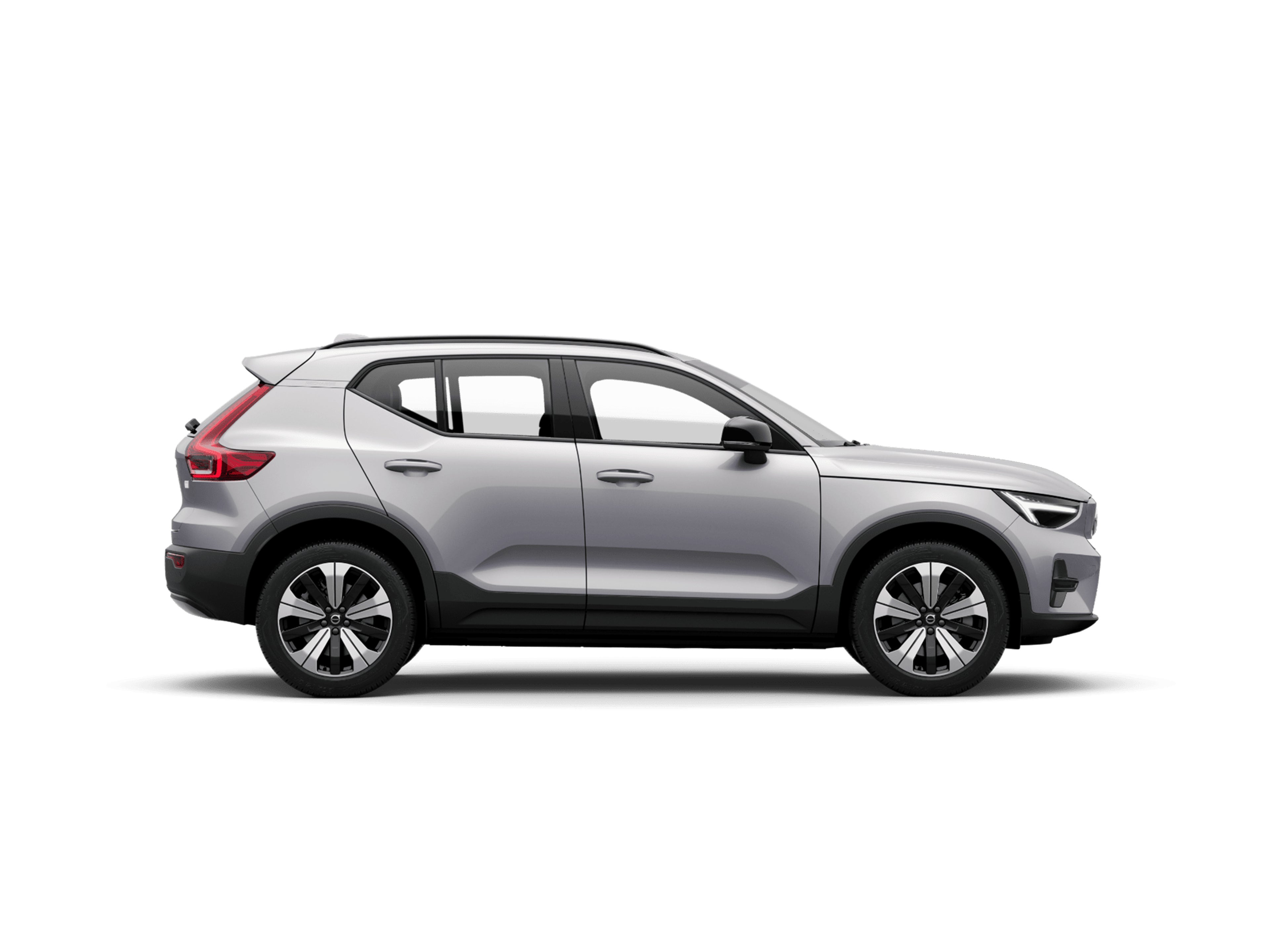 Zijaanzicht van een grijze Volvo EX40.