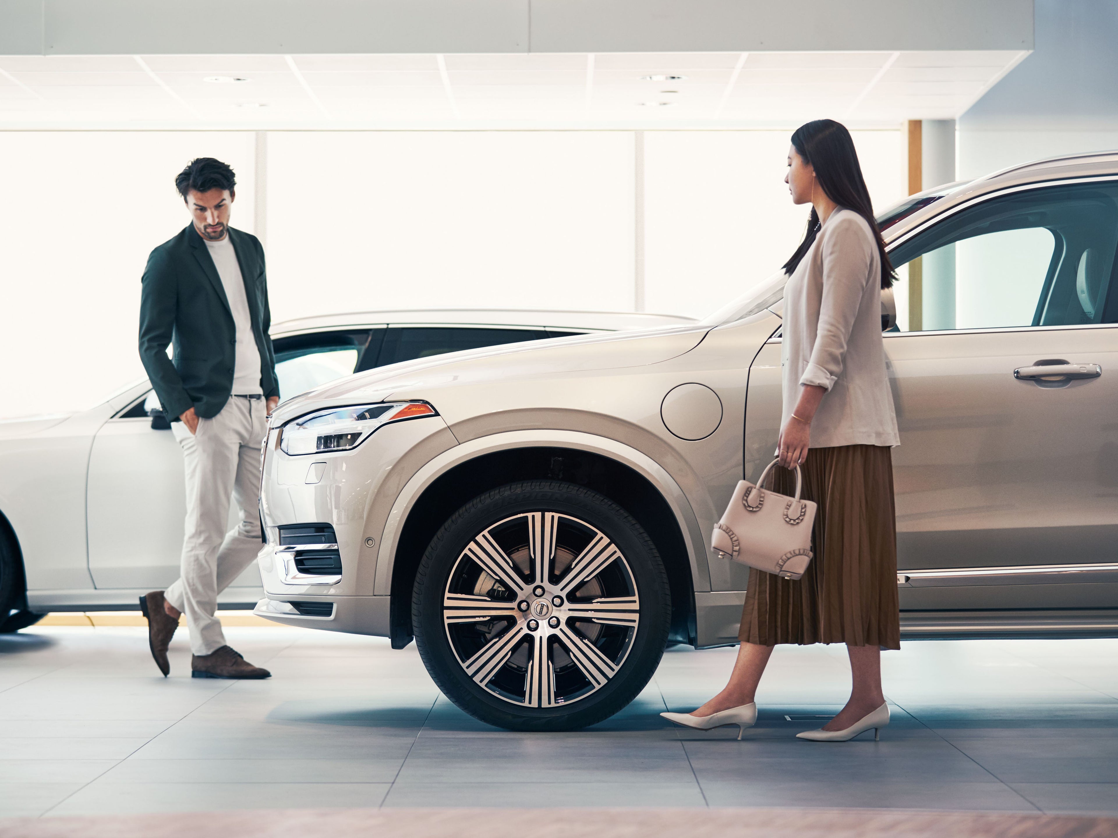 Customers inspecting vehicle