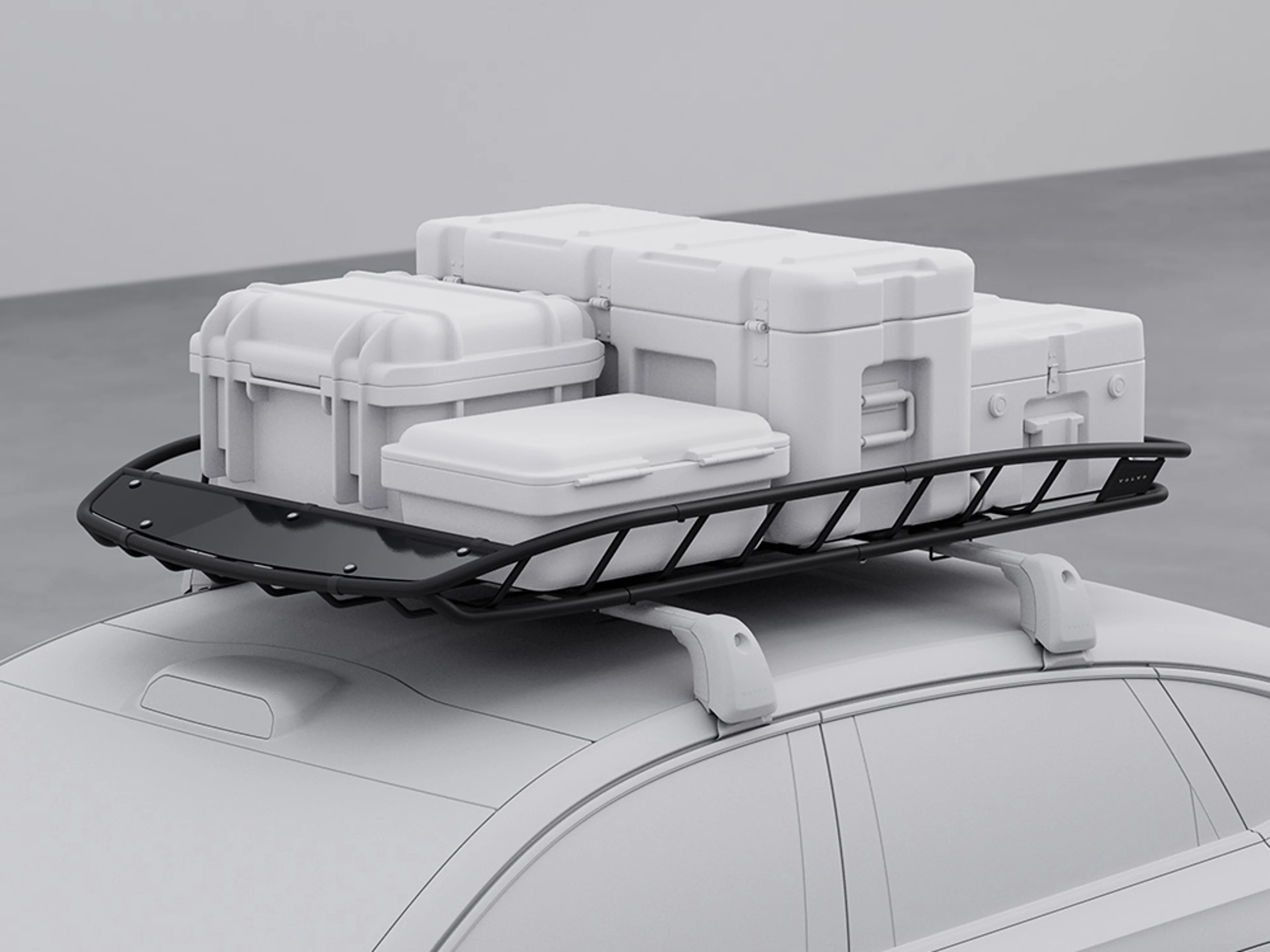 Panier avec valises monté sur le toit d'une Volvo ES90.