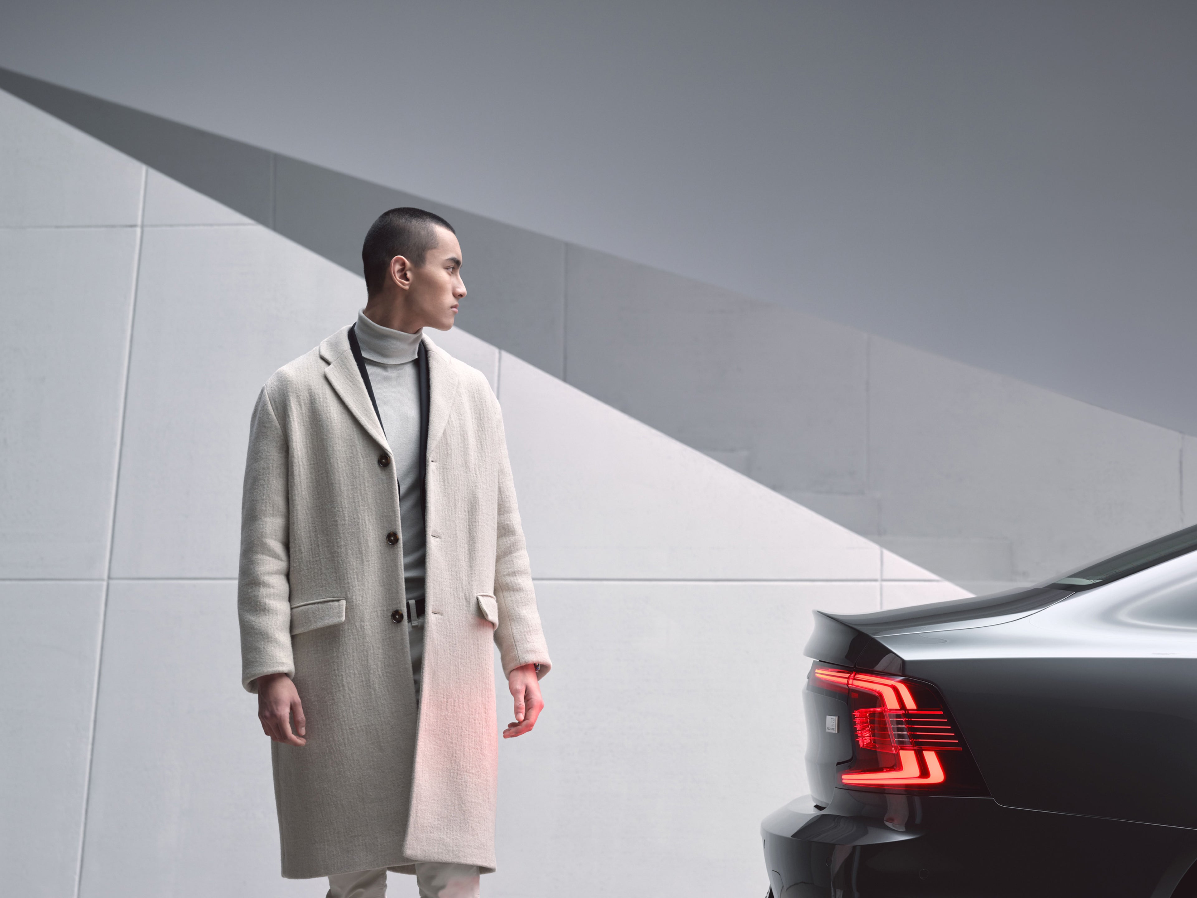 Man looking at Volvo S90