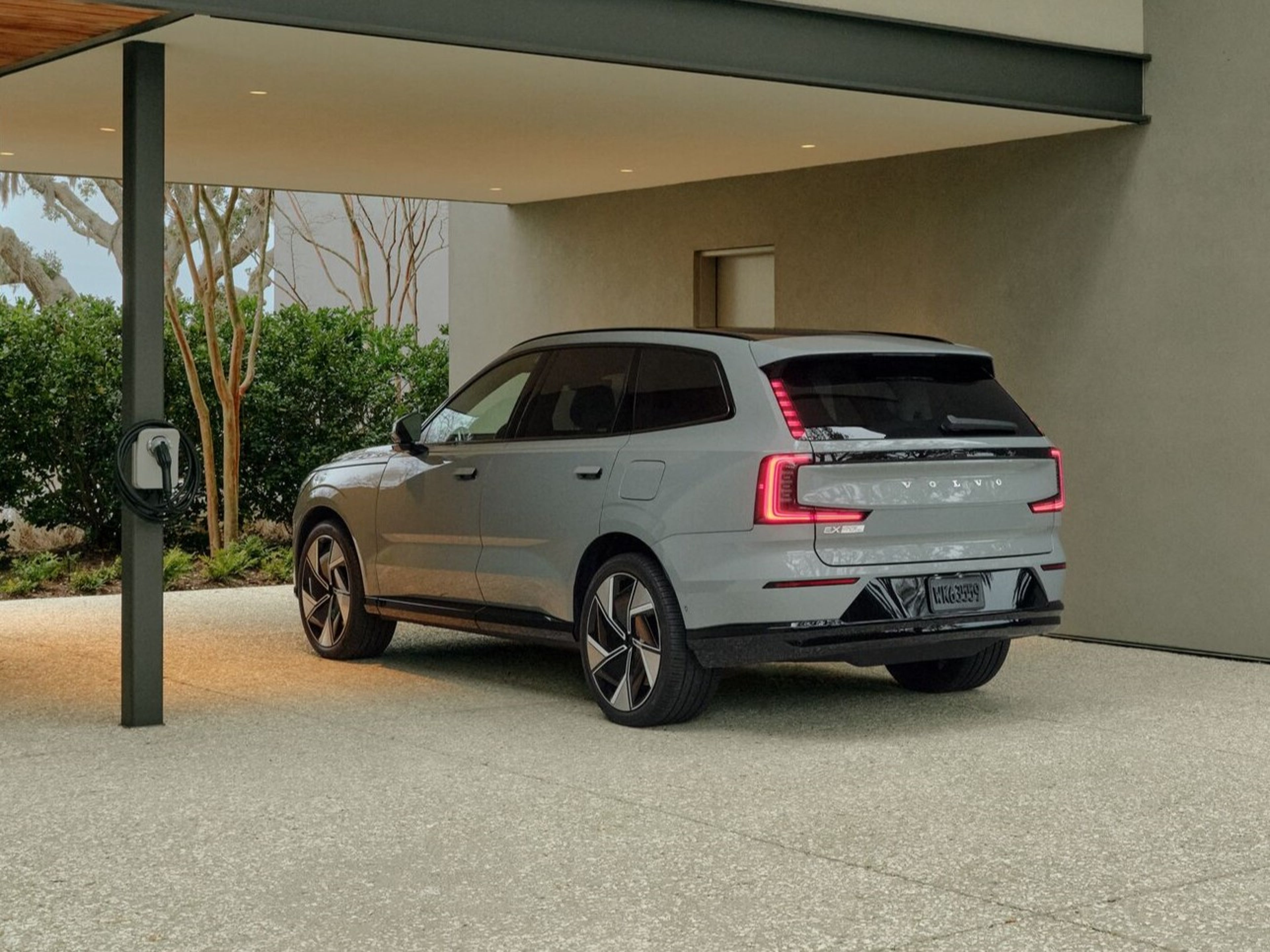 Volvo Cars Warranty - Volvo EX90 parked, charging near house