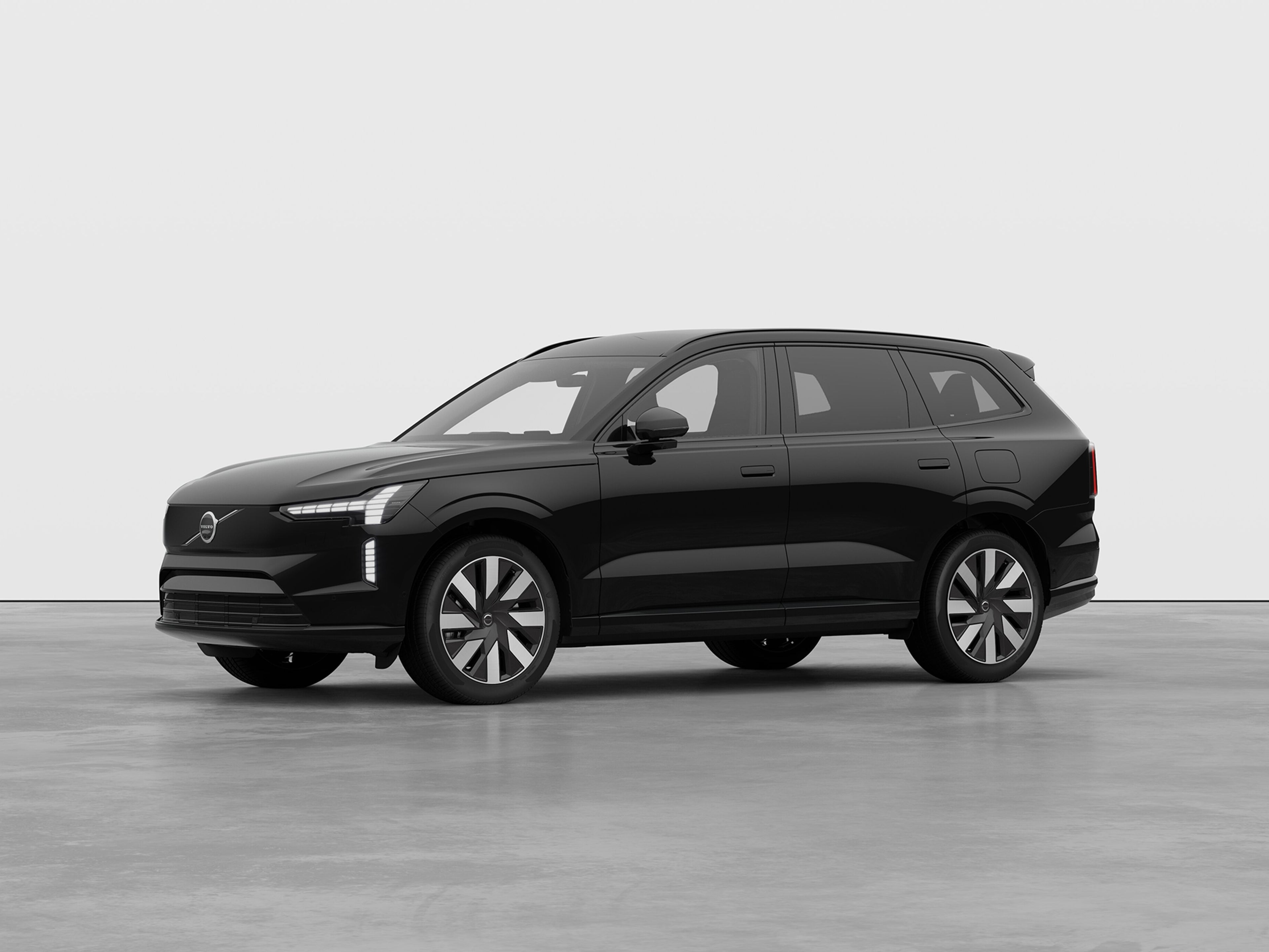 Seitliche Ansicht des Volvo EX90 Plus Executive Edition in schwarz.