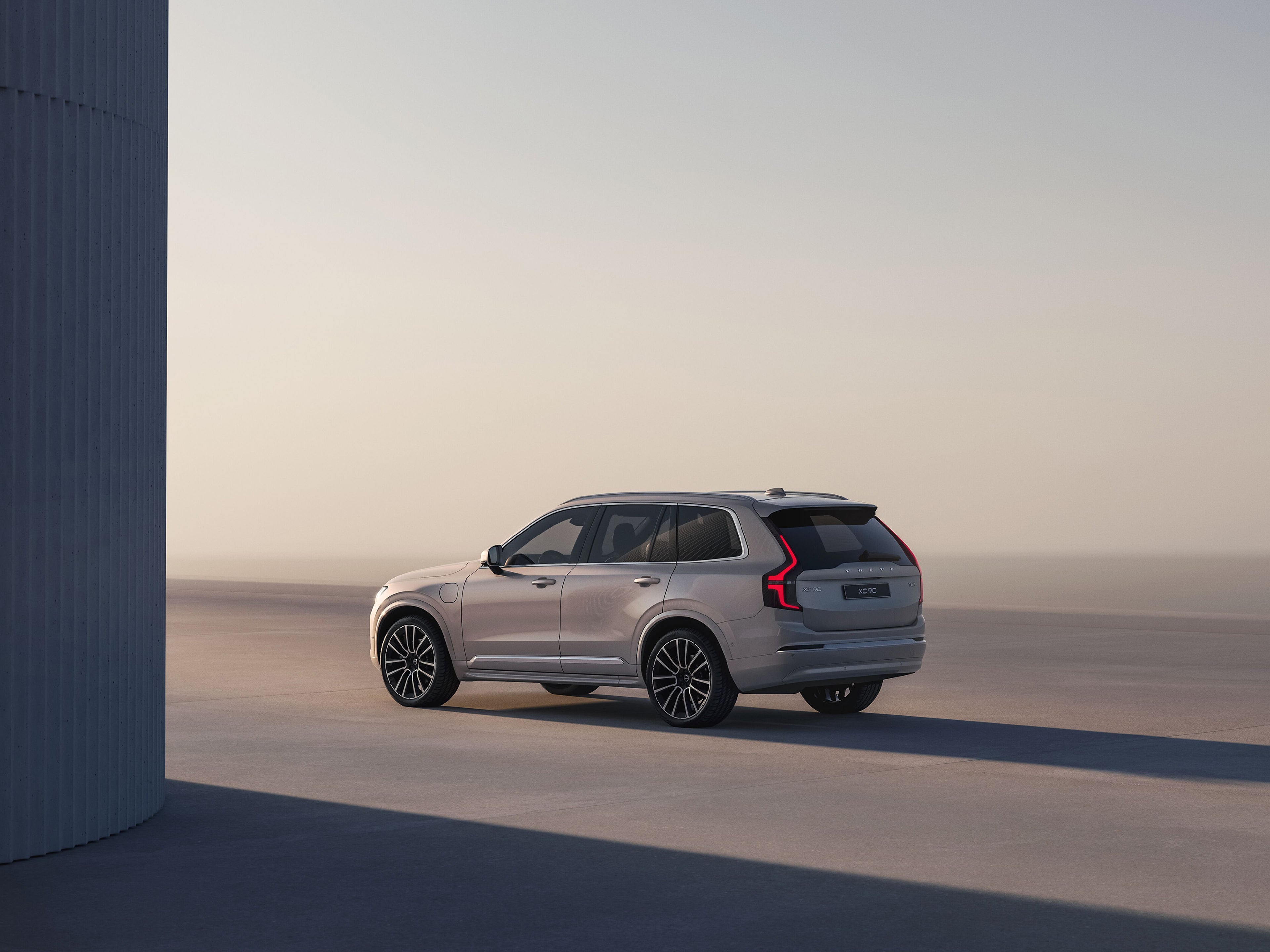 XC90 driving on an empty, quiet road