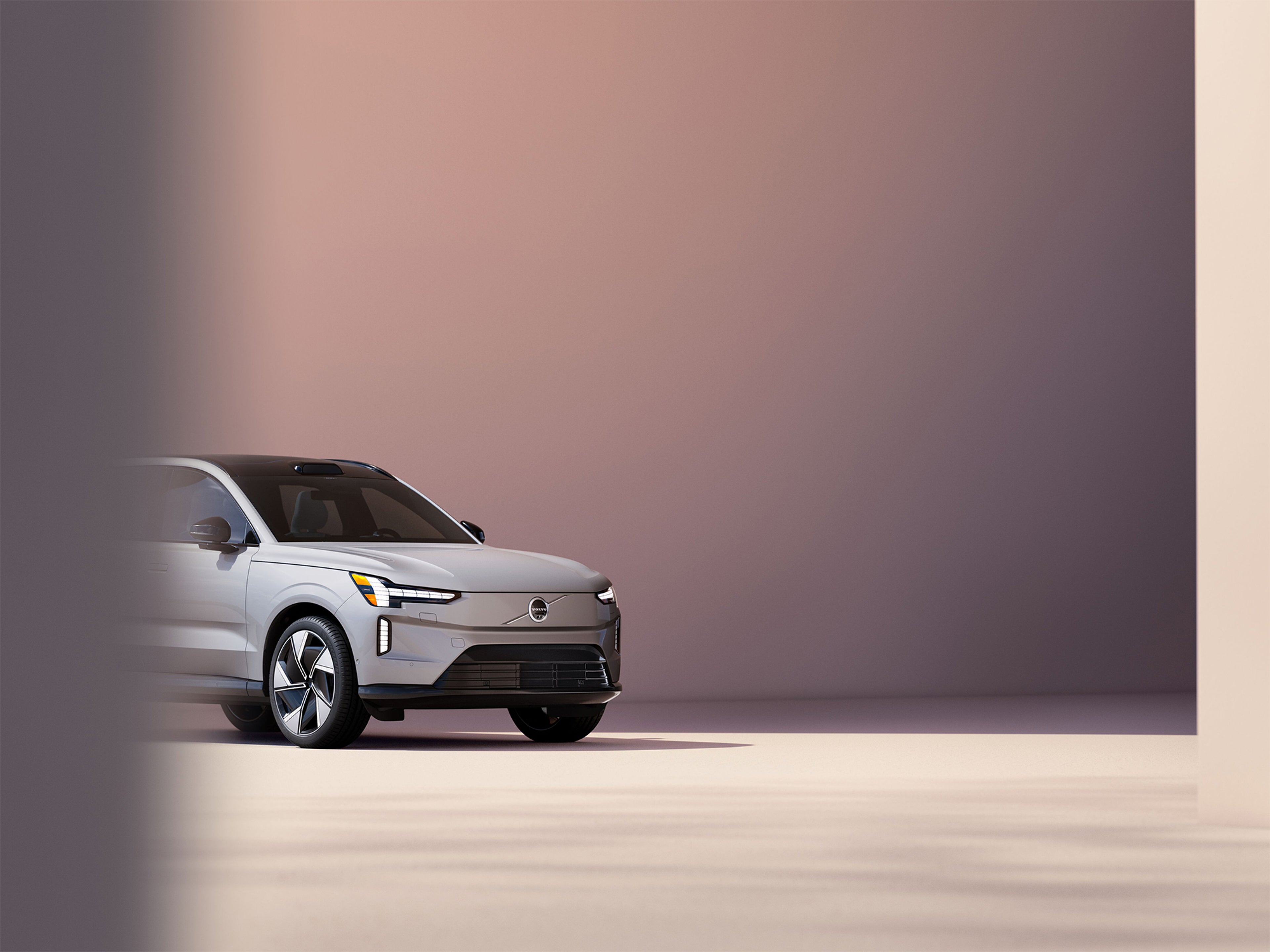 Fast Company’s Innovation by Design Award Finalist - Volvo EX90 parked in front of pink background