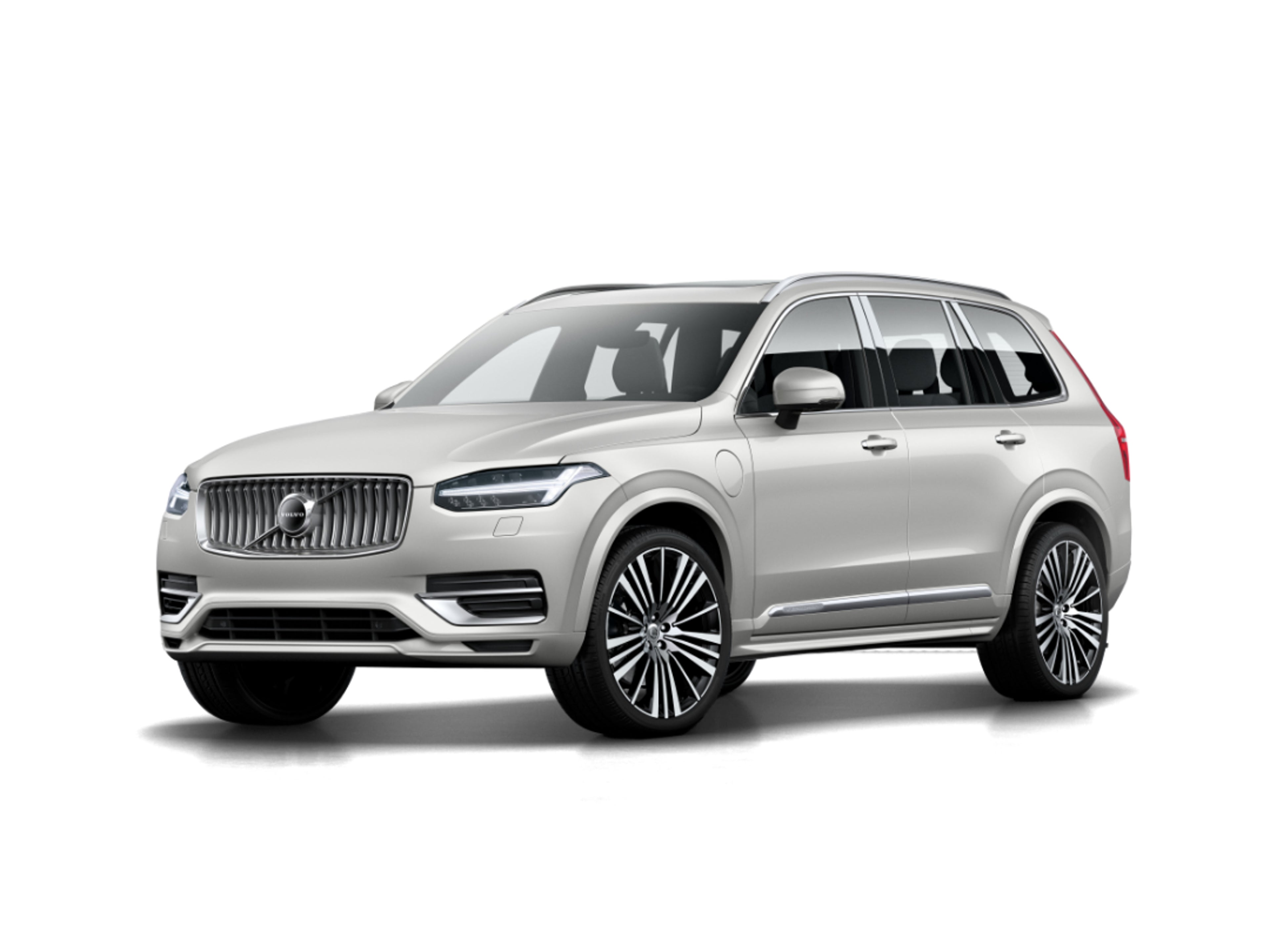 Volvo XC90 parkiran ispred suvremene sive fasade, prikazan iz bočnog profila, s oznakom '0 % kamata' u crnom krugu u gornjem desnom kutu.