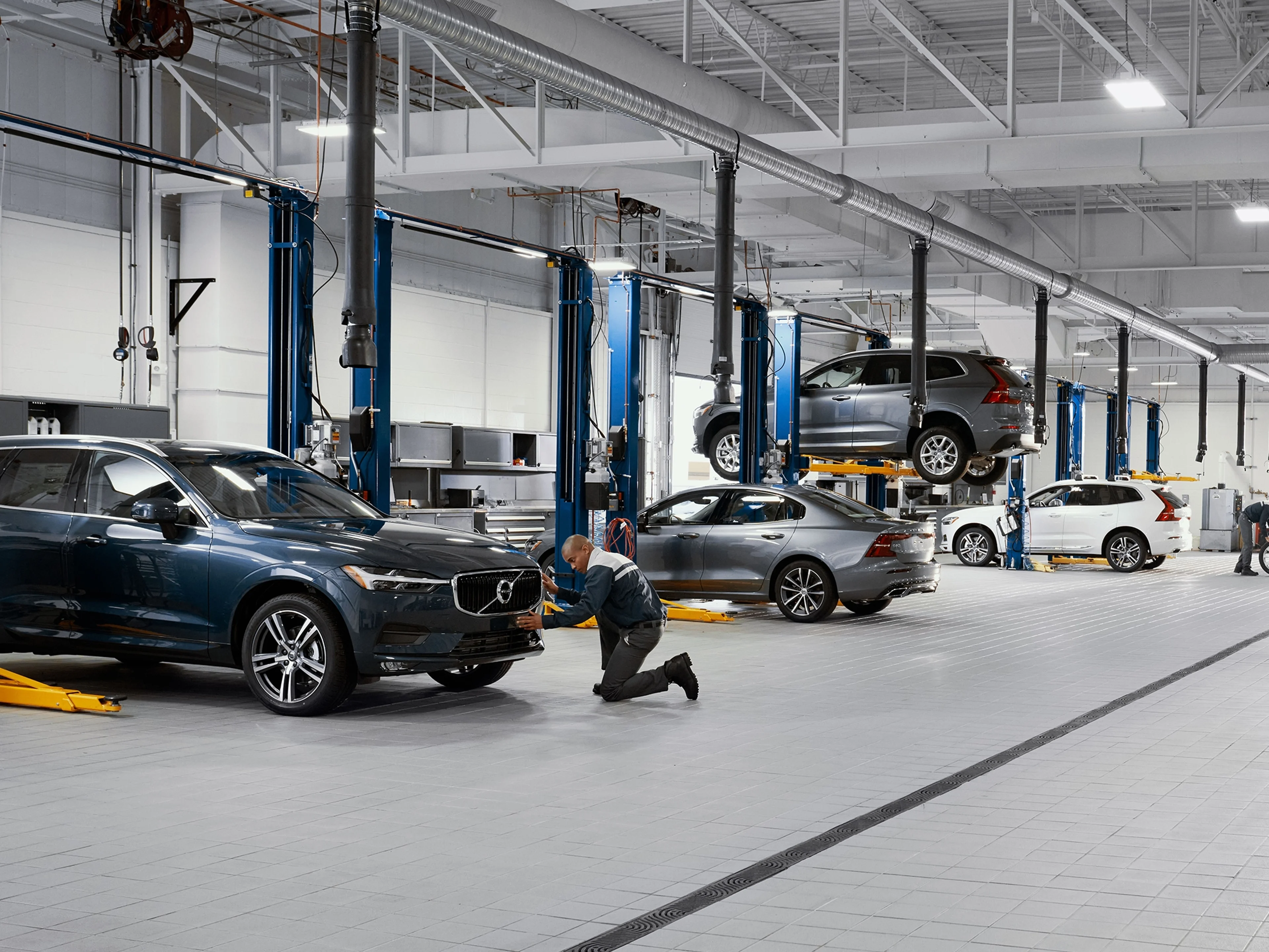 Volvo being worked on by a technician