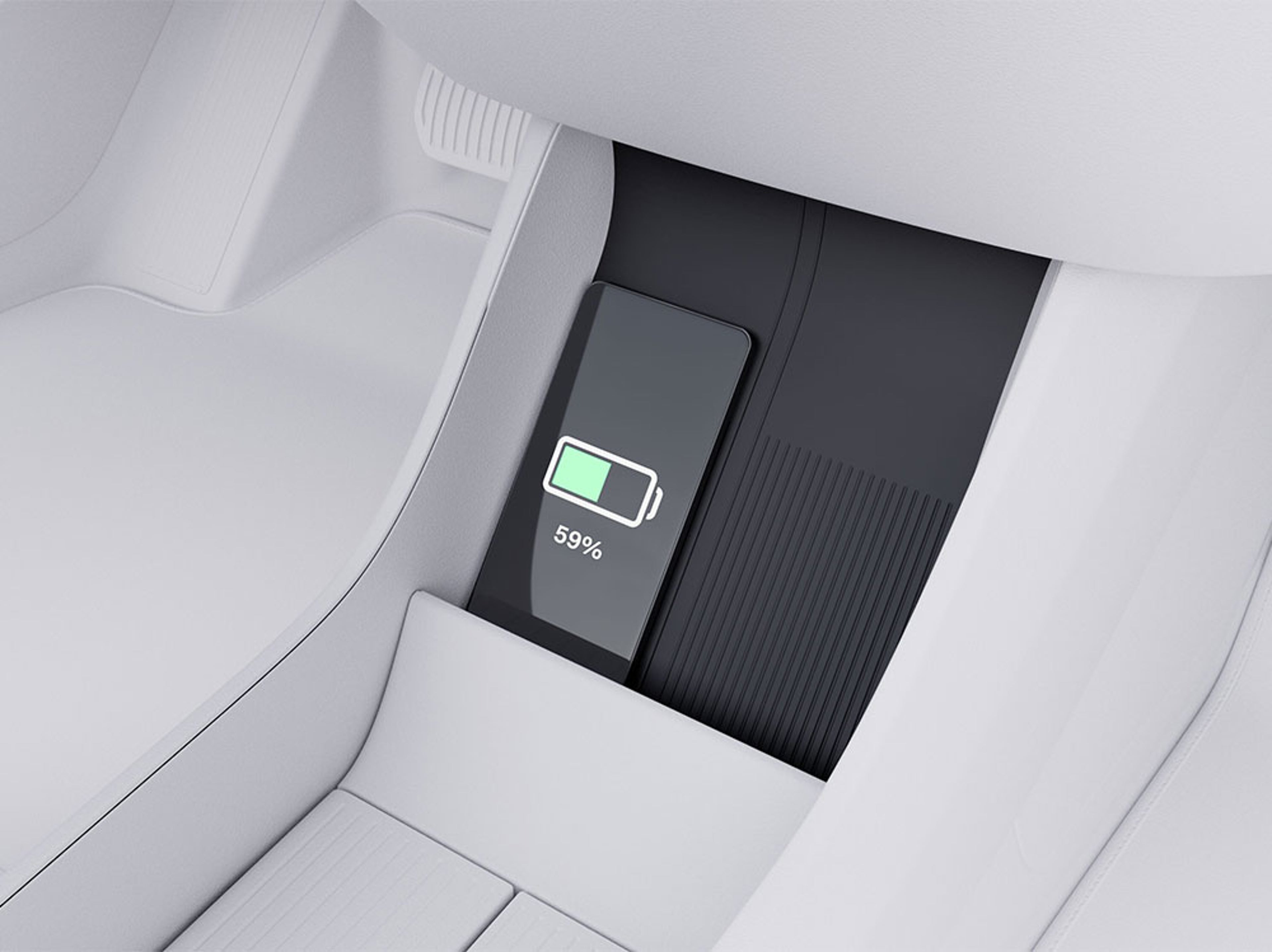 Smartphone posé sur le chargeur à induction du EX30.