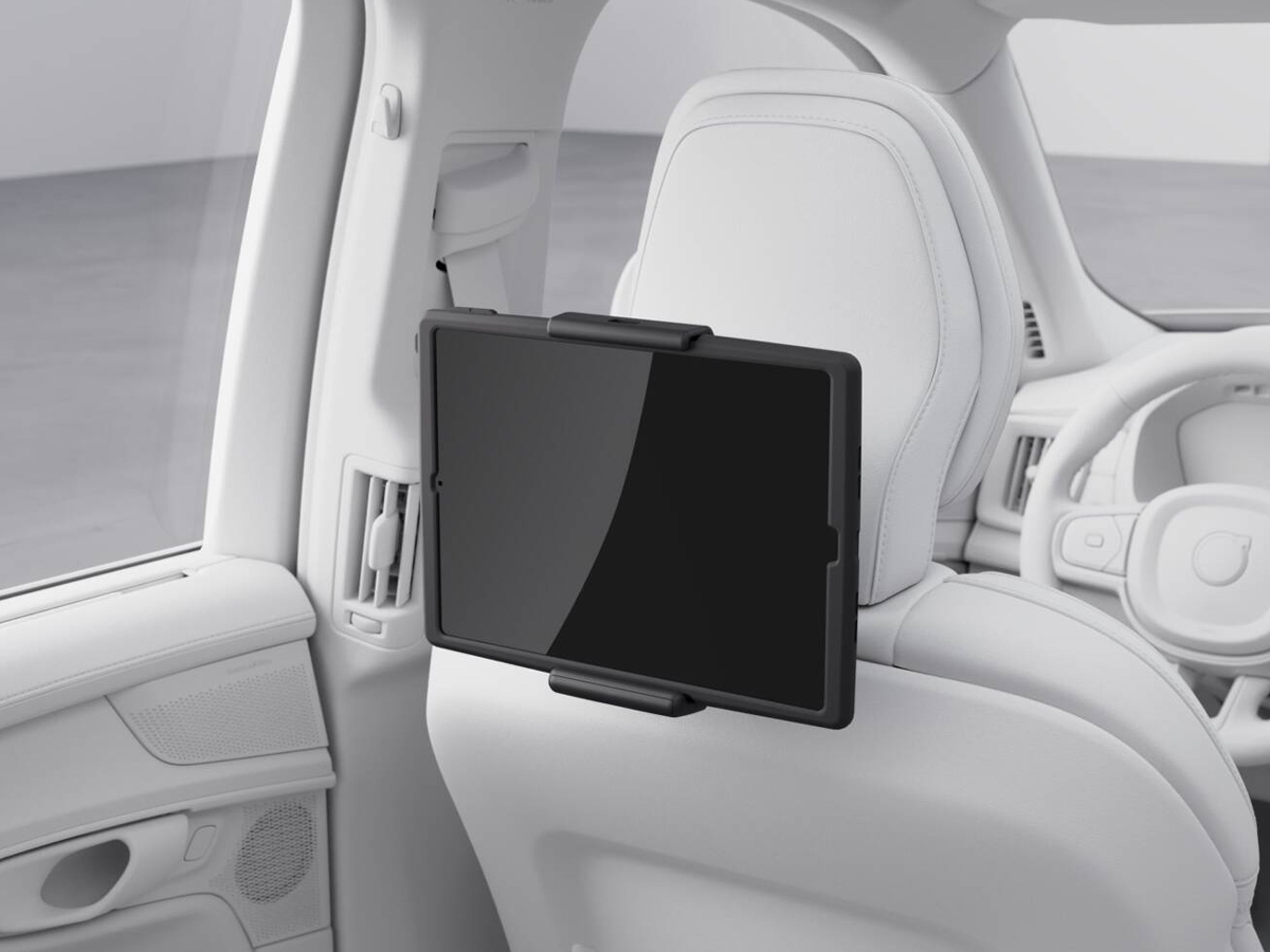 Hållare för surfplatta monterad på säte.