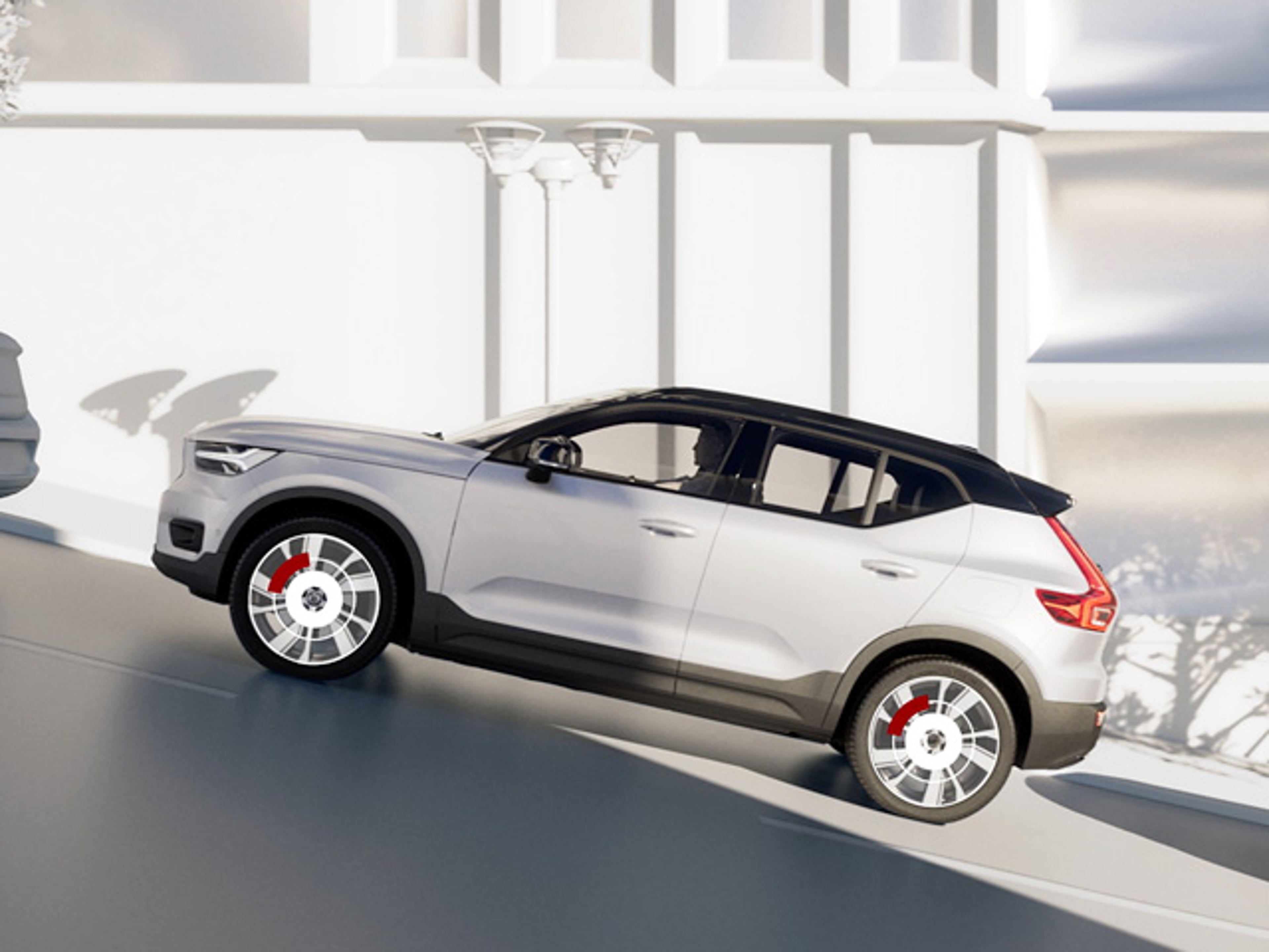 Vit Volvo XC40 Recharge från sidan