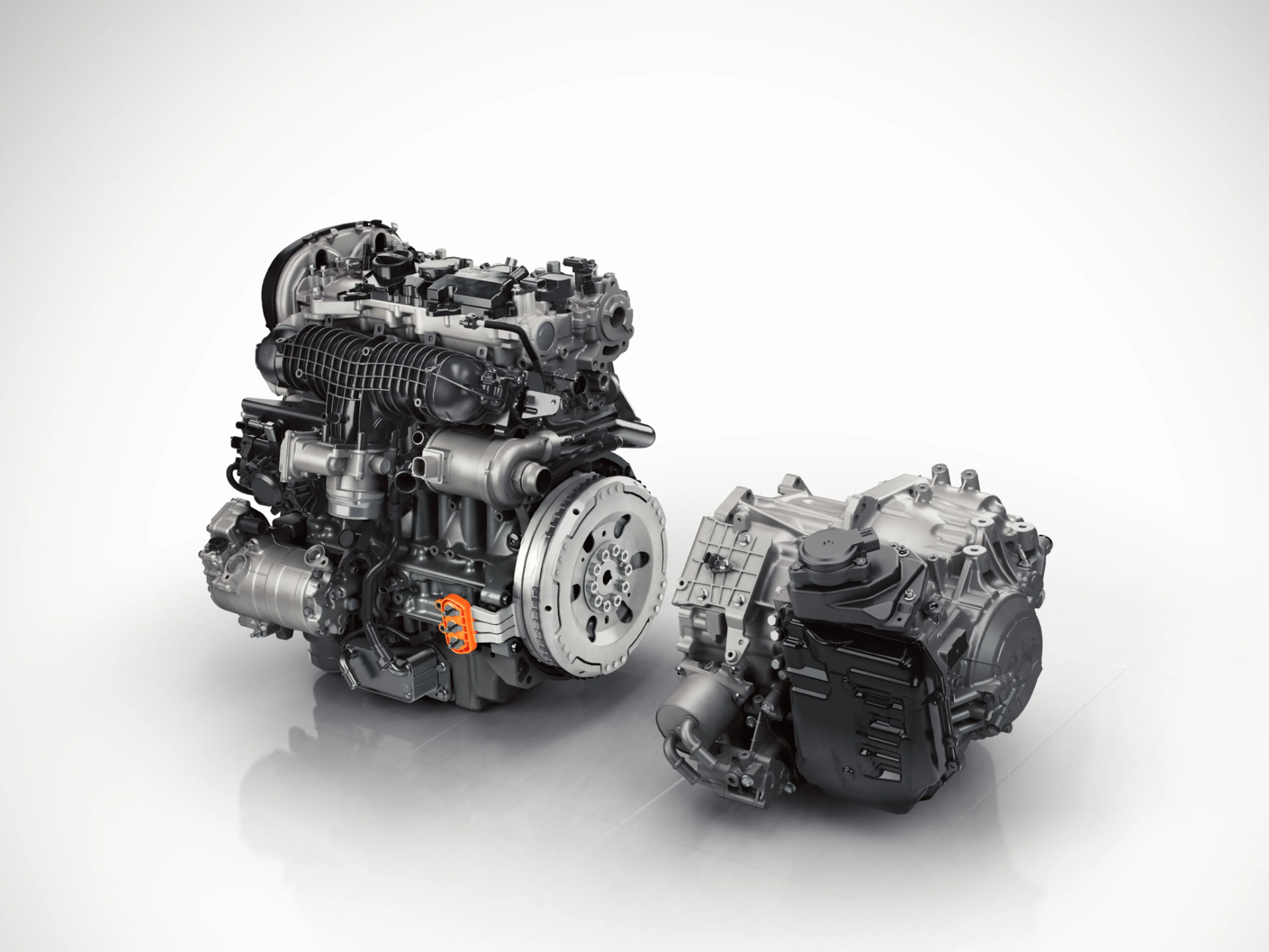 Abbildung eines Volvo Motorblocks und diverser Ersatzteile