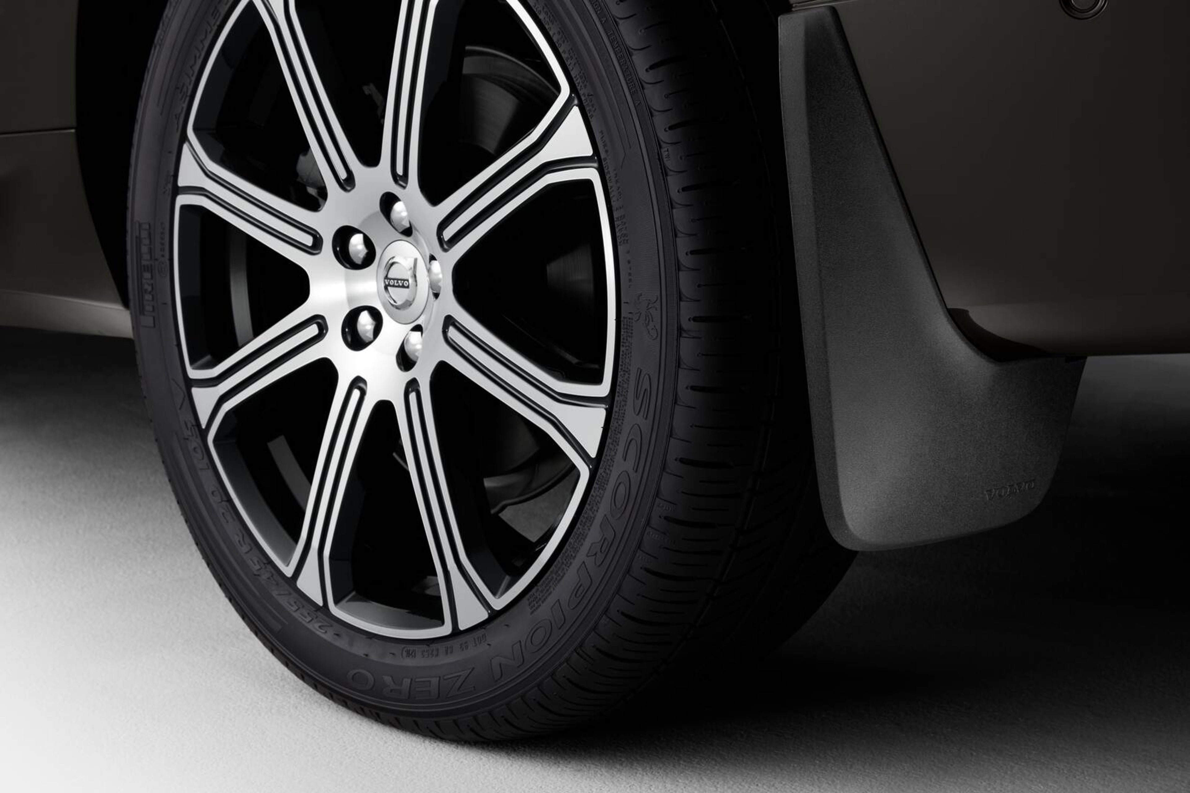 Close up of Volvo car wheel with mudflap added