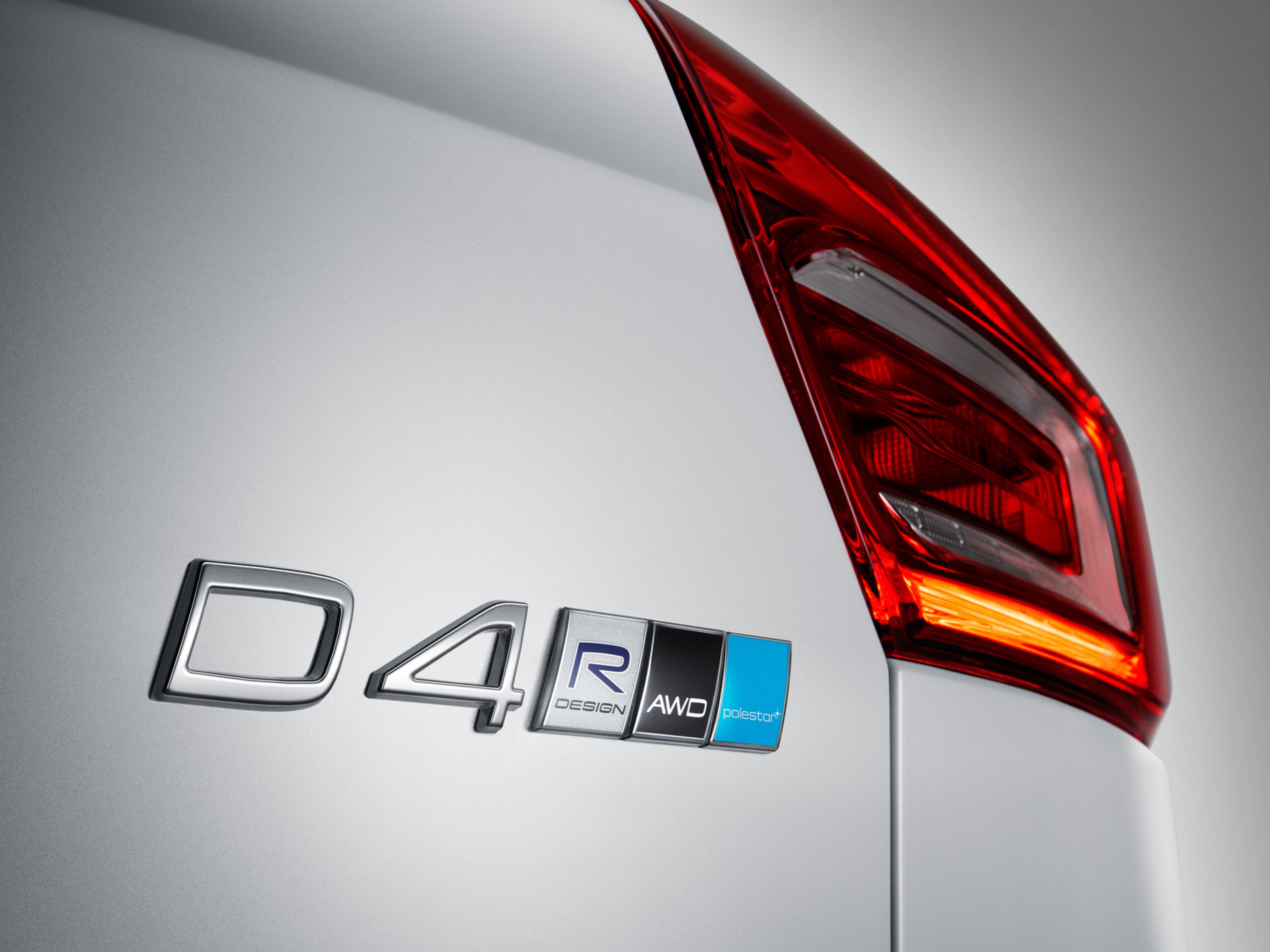 Close up of silver Polestar D4 model badge