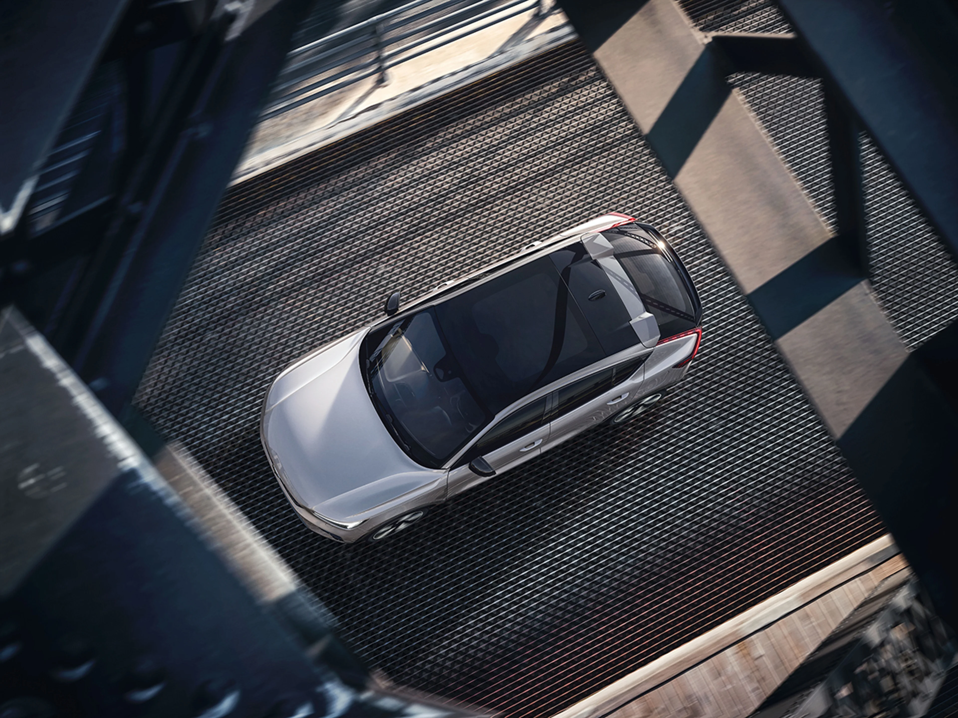 Volvo Overseas Delivery Logistics and Shipment - Top down view of car on road