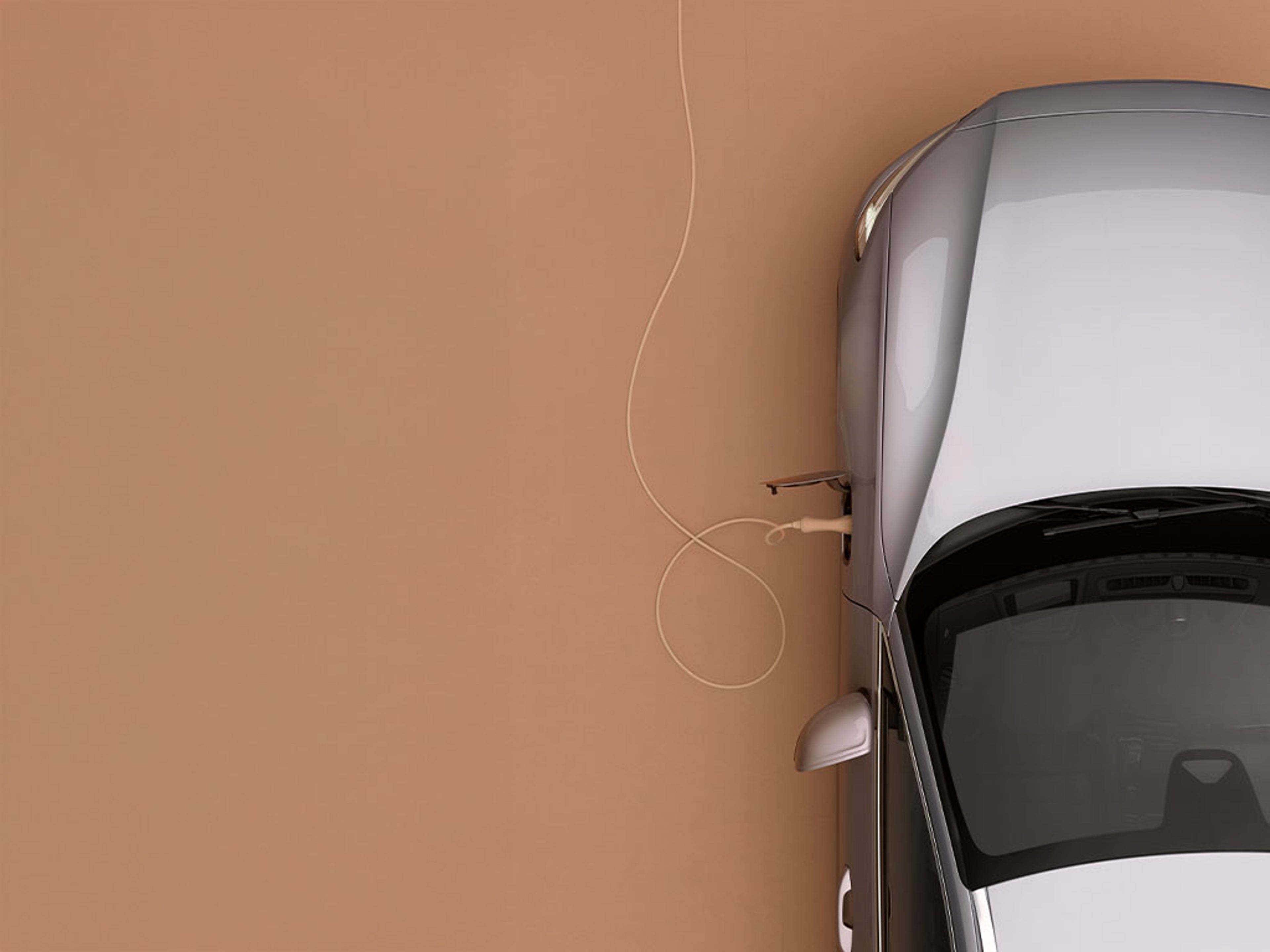 Ein Volvo V60 Plug-in Hybrid an einer Ladestation.