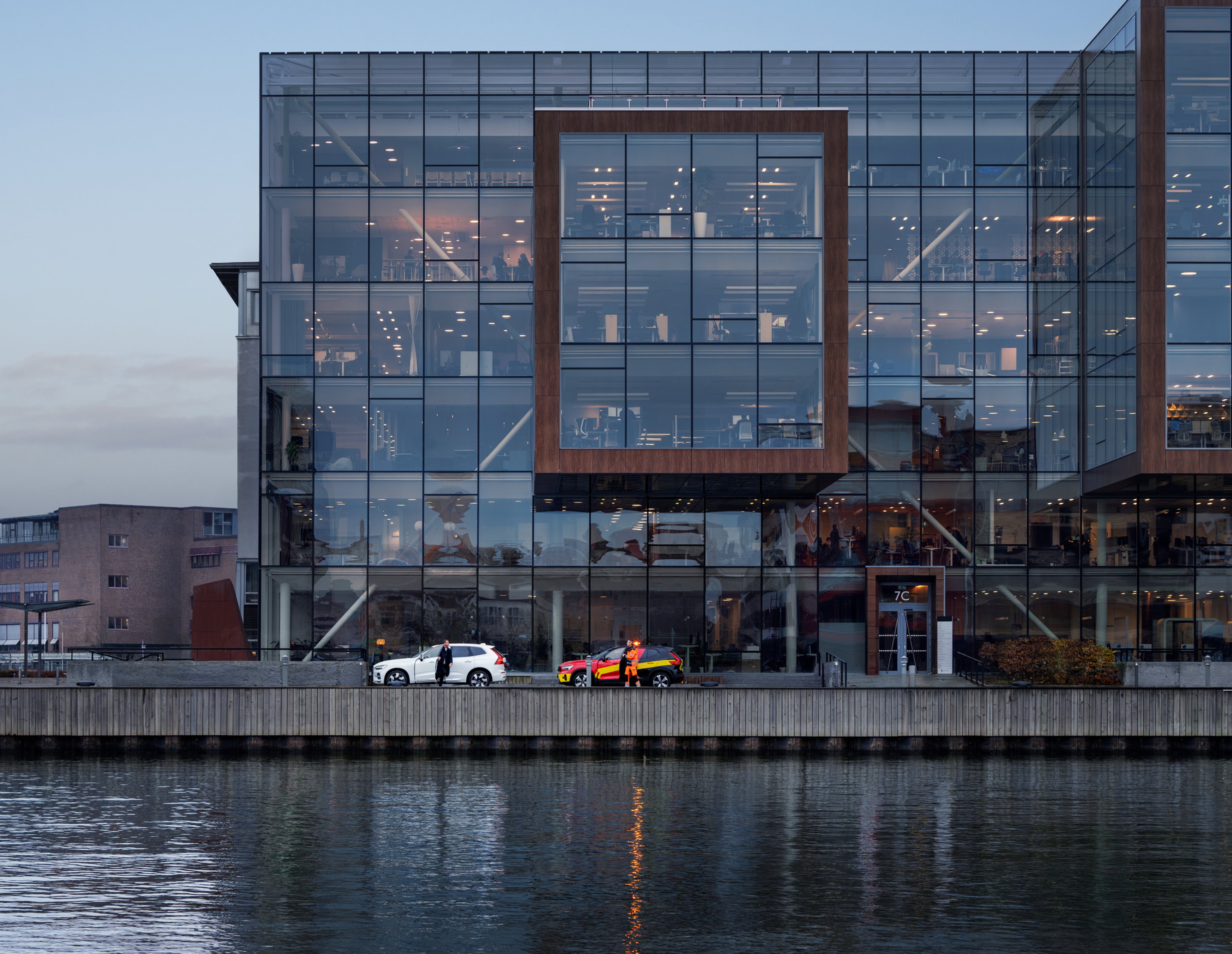 Volvo roadside assistance helping someone stood beside their Volvo car next to a river