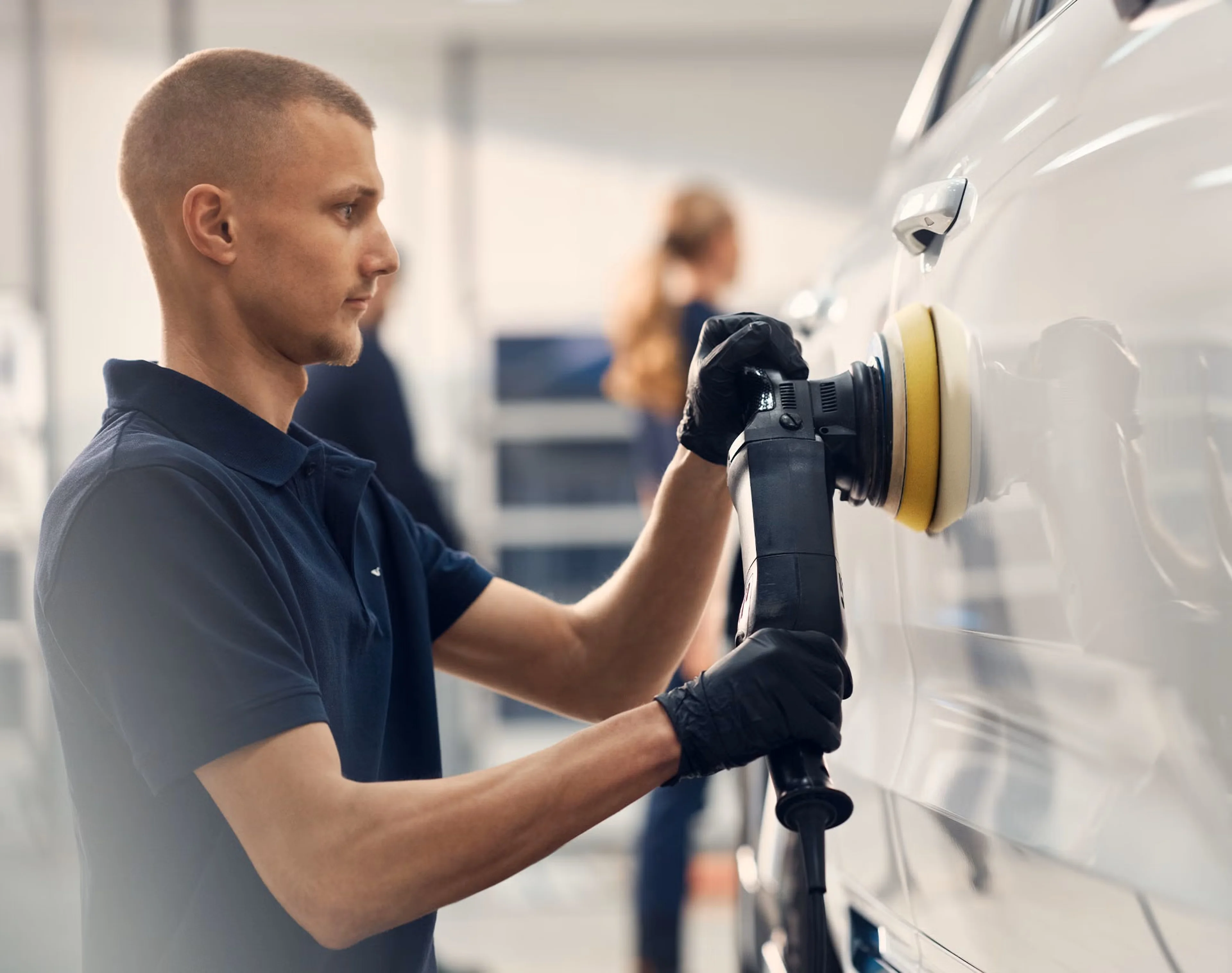 Man polishing car